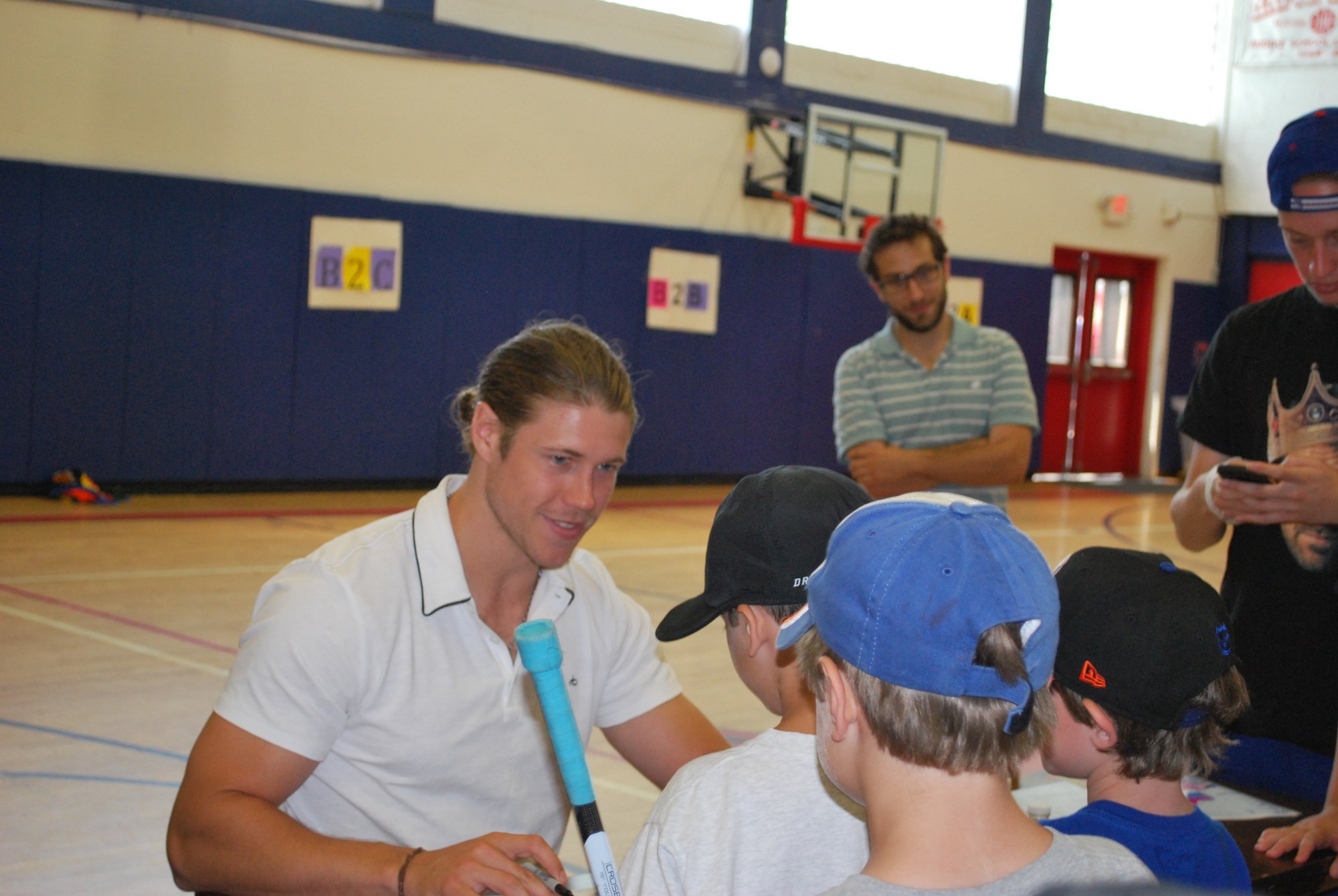 Islander Matt Martin signed autographs for Hillel campers after speaking to them about how he got to the National Hockey League.