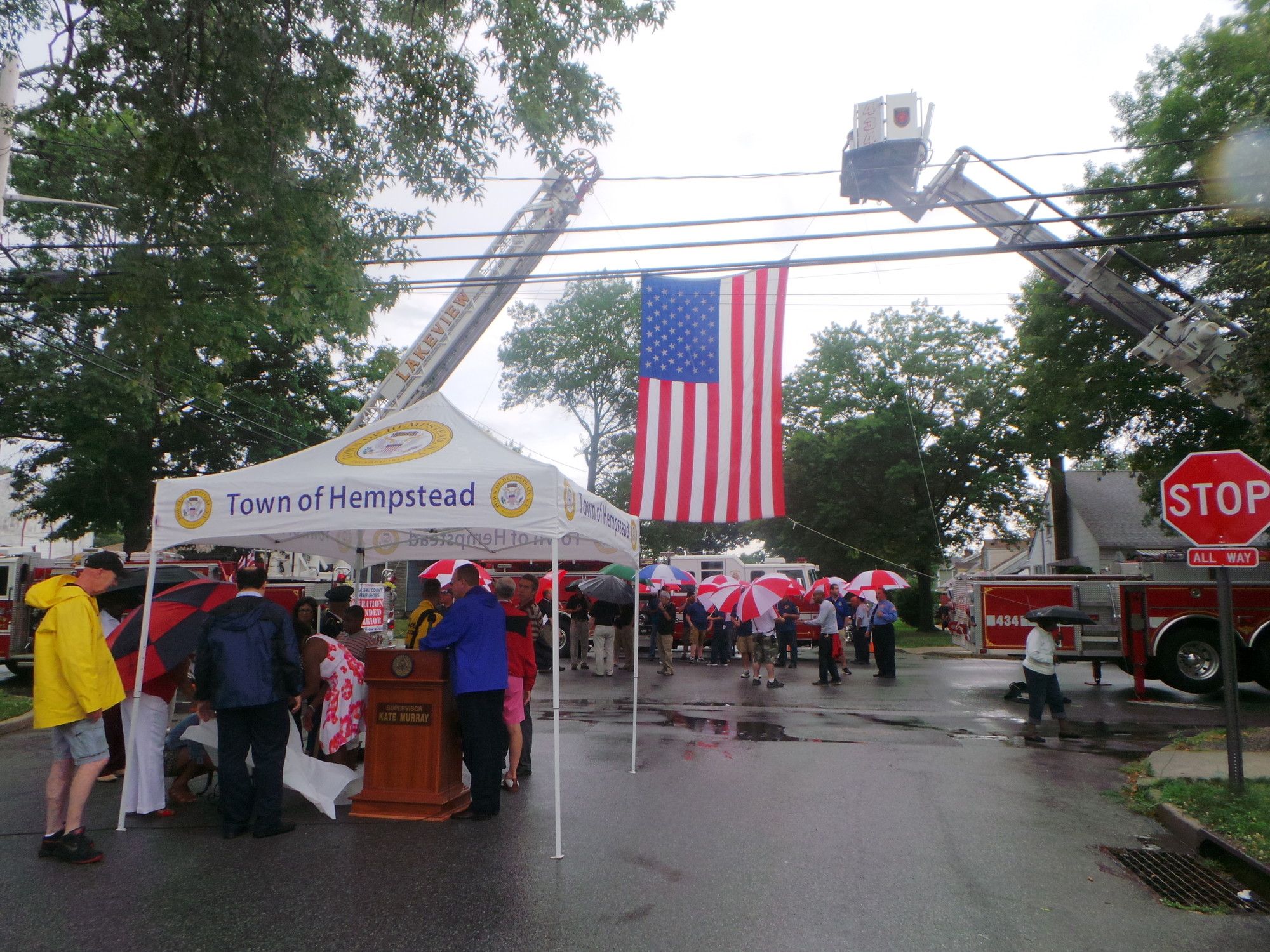The Lakeview and Malverne fire departments provided a flag arch for the ceremony.