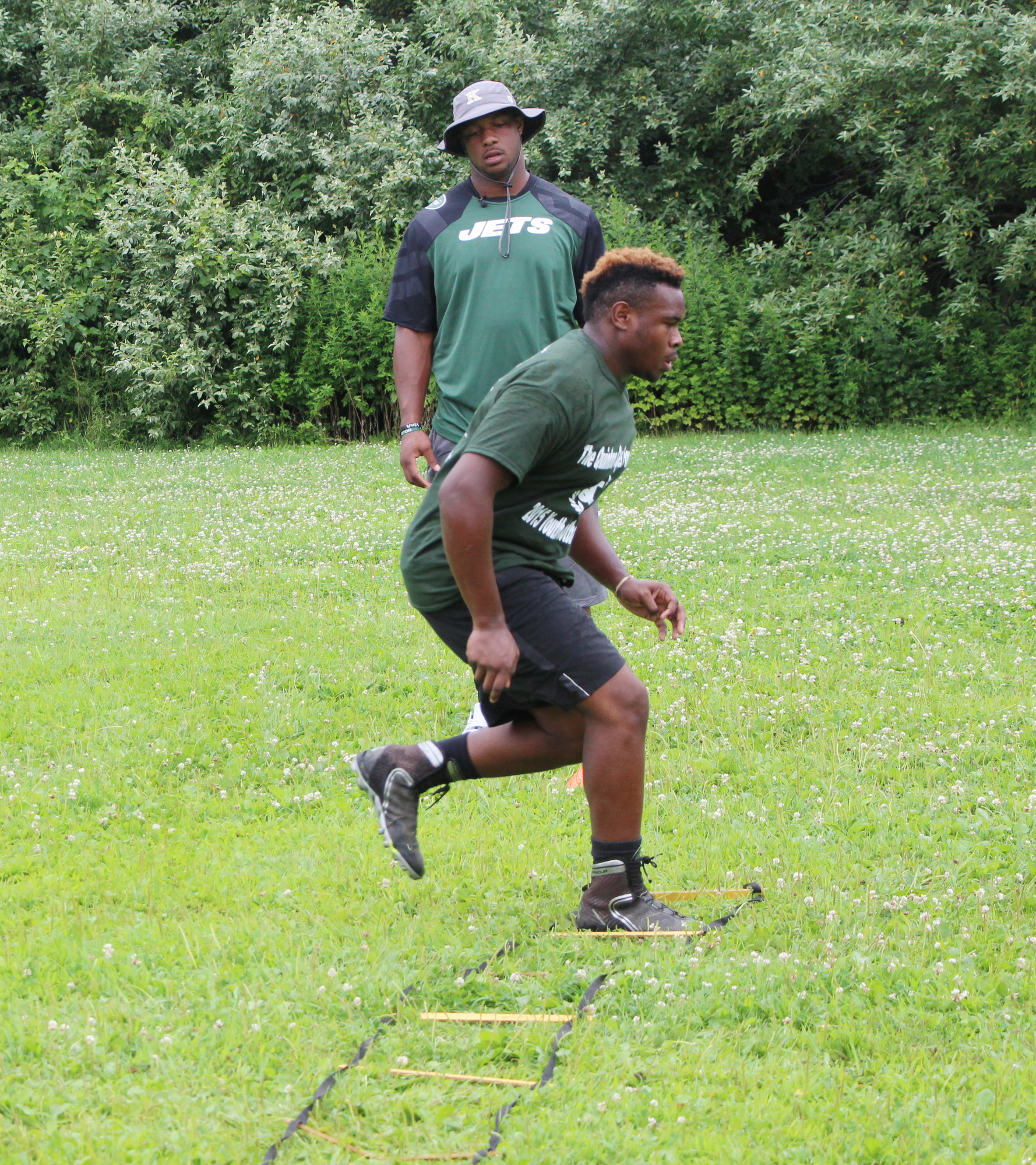 Baldwin High School football player Jahcorie Norworthy worked on his footwork as Coples watched.