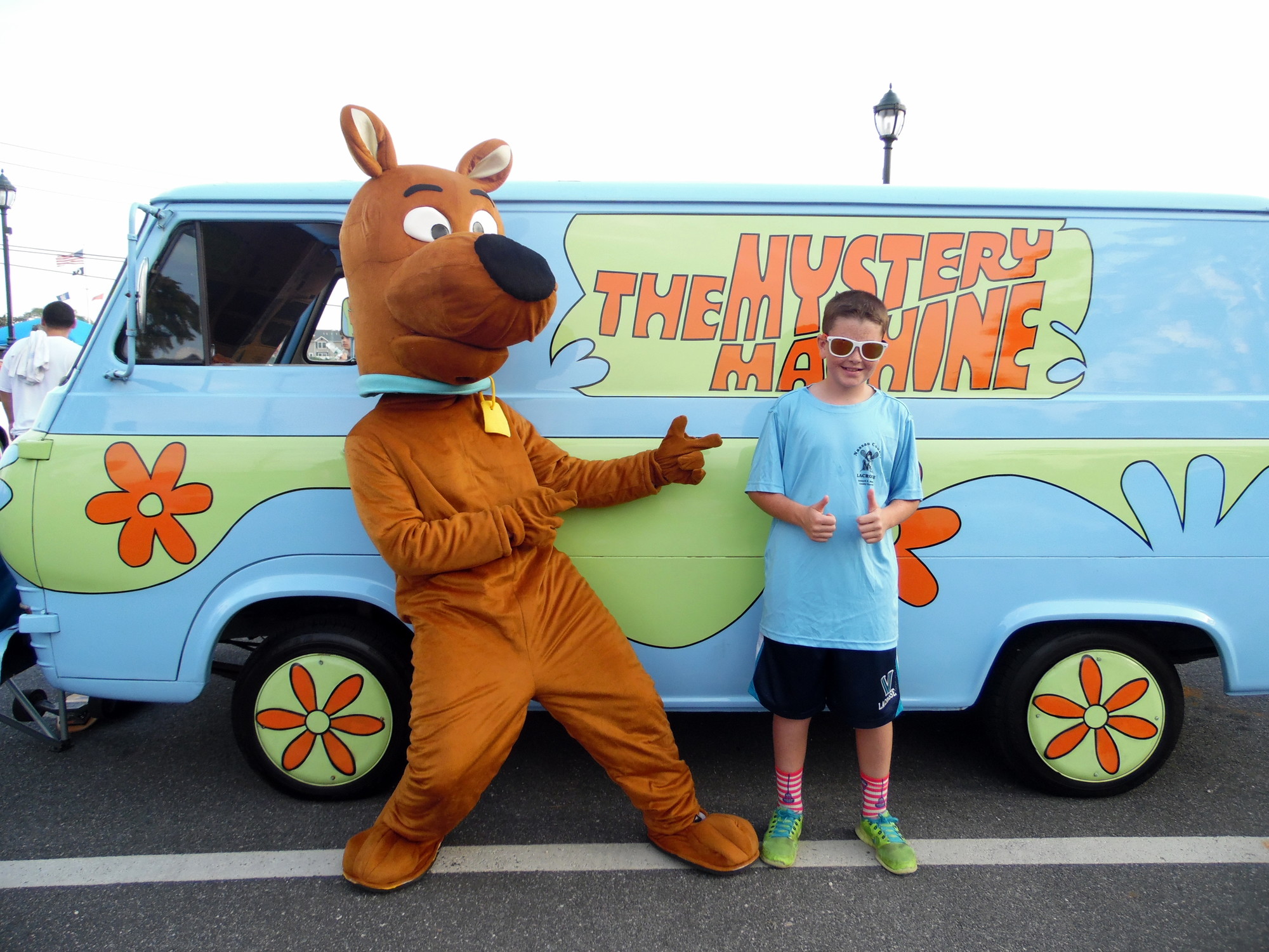 Colin Grace, 11, met Scooby Doo and his Mystery Machine at the East Rockaway Car Show Monday night. The event was a fundraiser for the school district’s education foundation.