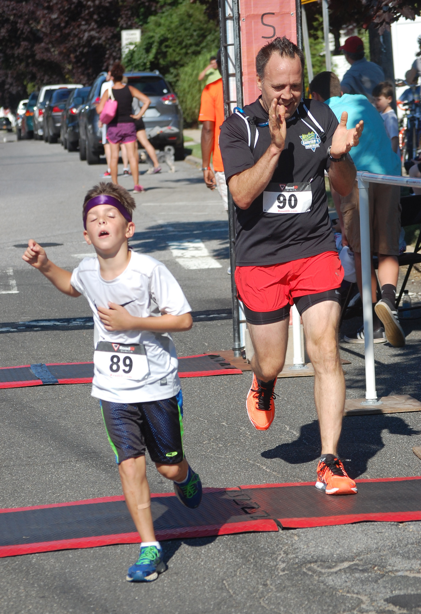 Noah Geyer, 9, and his father, Troy, of Wantagh, crossed the finish line together.