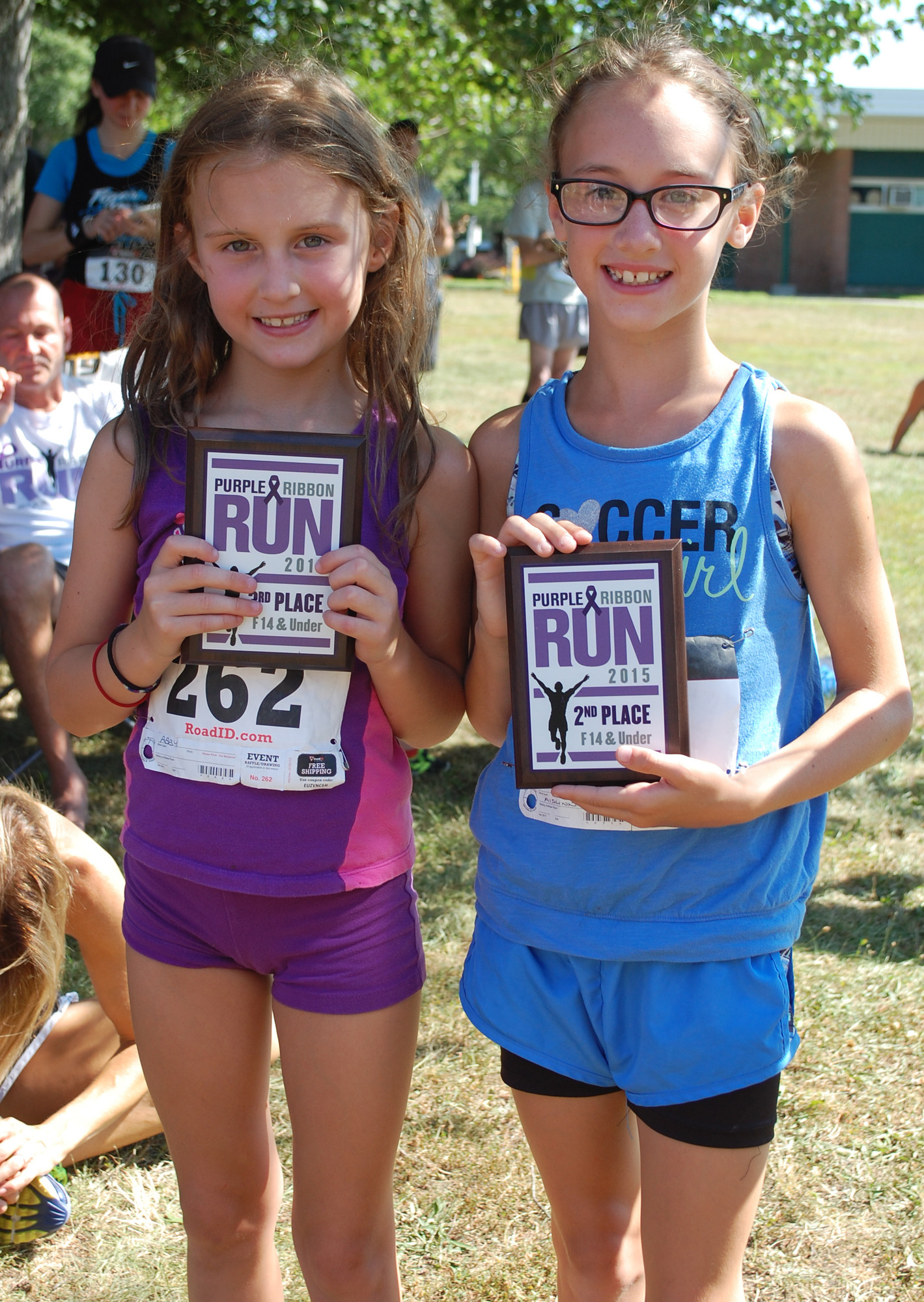 Sisters Abby and Aislinn Frazer, from Wantagh, finished third and second, respectively, among girls in the 14-and-under age group.