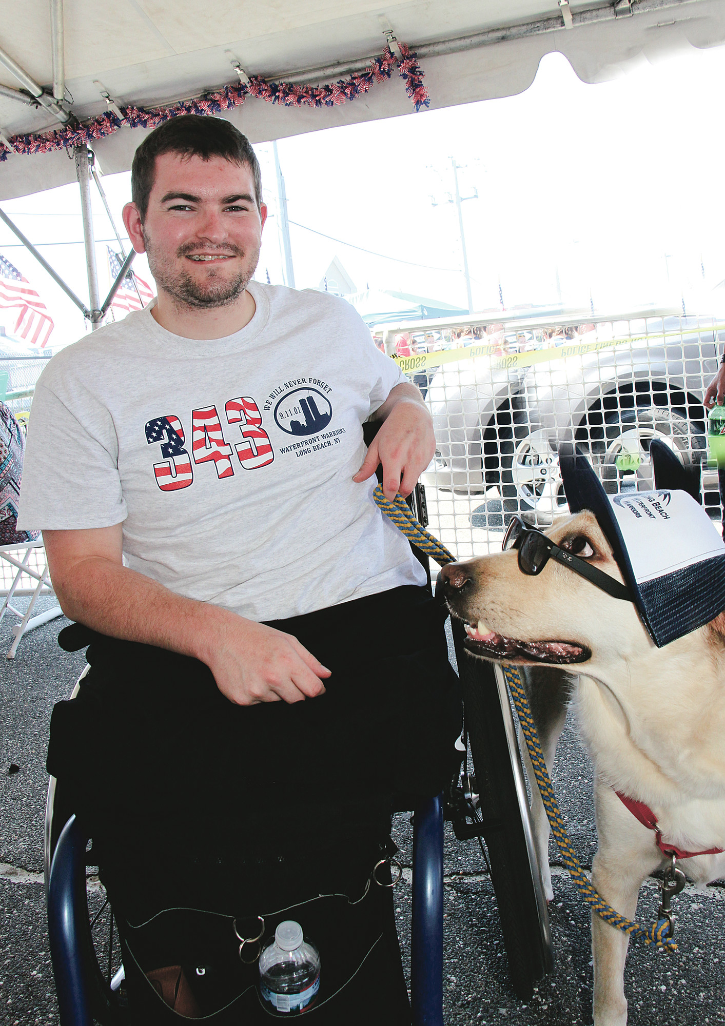 Army Cpl. Cody Stanton, a veteran of Afghanistan and a Purple Heart recipient, with his service dog, Brent.