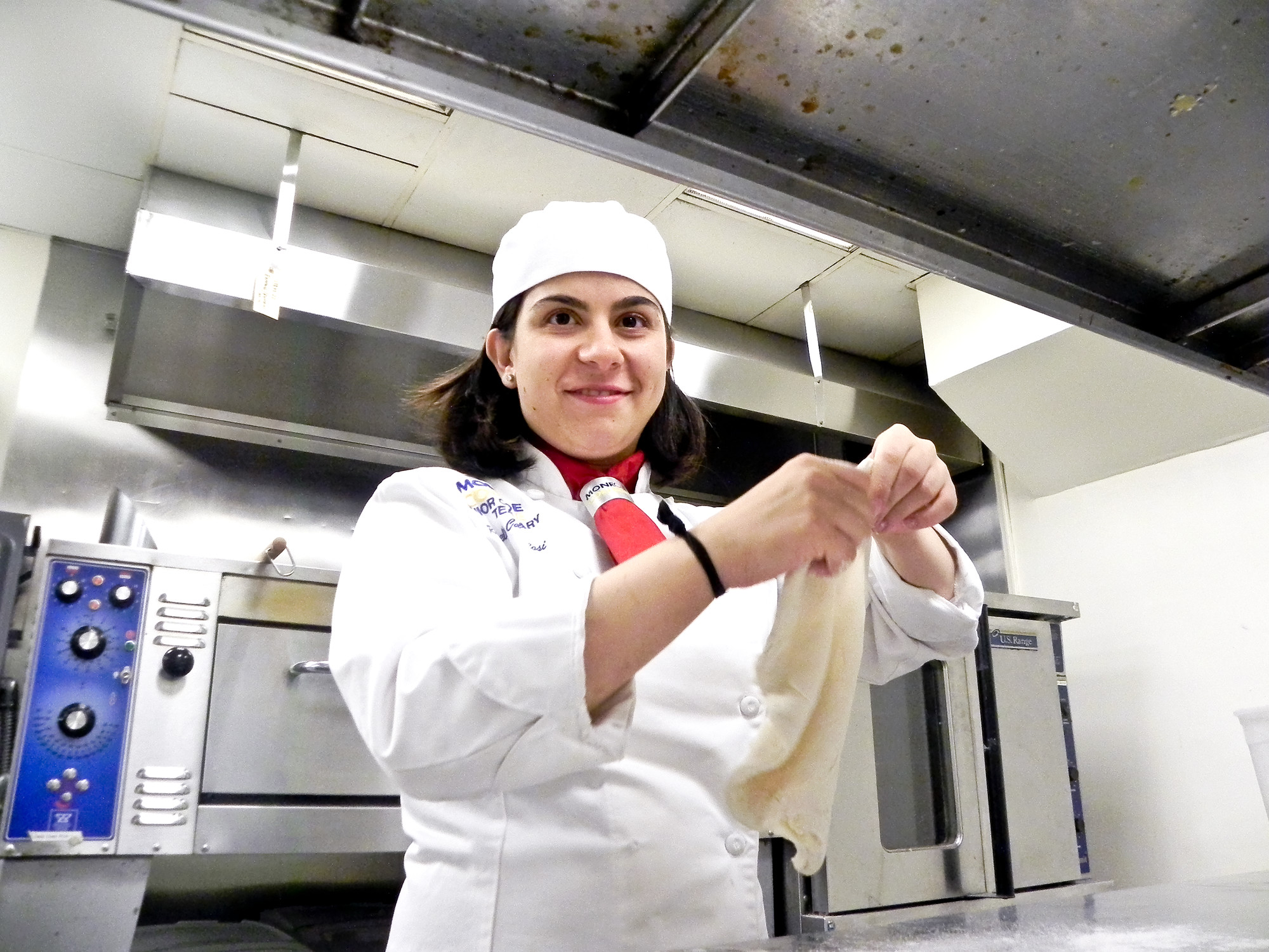 Rossella Cangialosi, 20, here cooking pizza at the School of Hospitality Management and Culinary Arts at Monroe College, has been passionate about cooking since she was 6 years old. The 2012 East Meadow High School graduate competed for the title of Student Chef of the Year in Florida on Aug. 1.