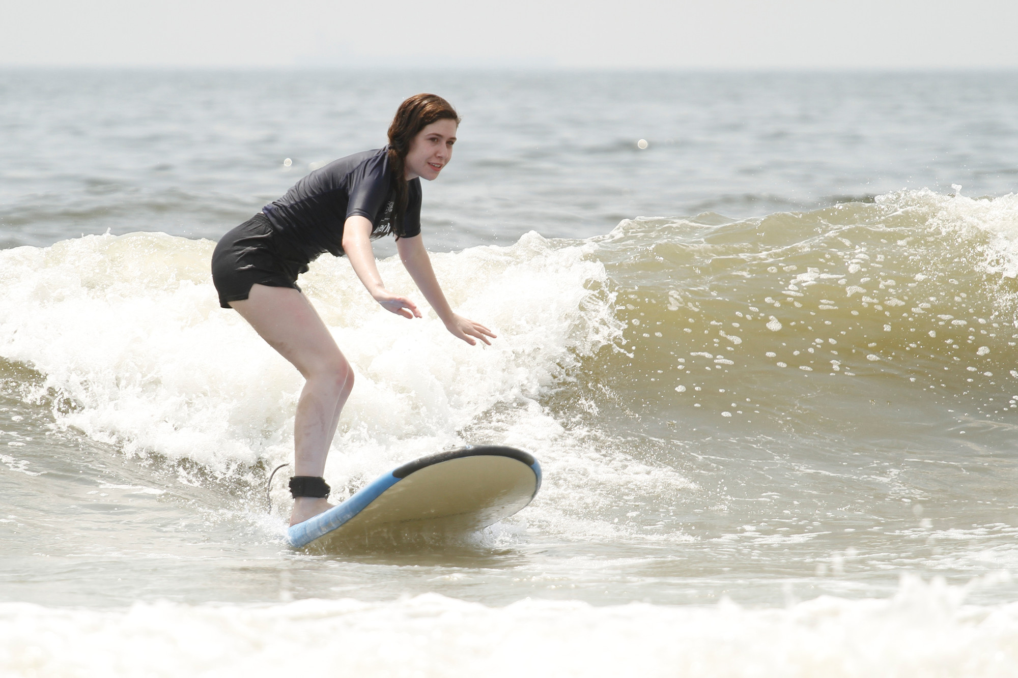 Herald intern Shannon Plackis tried surfing for the first time in our “Never Have I Ever” series.