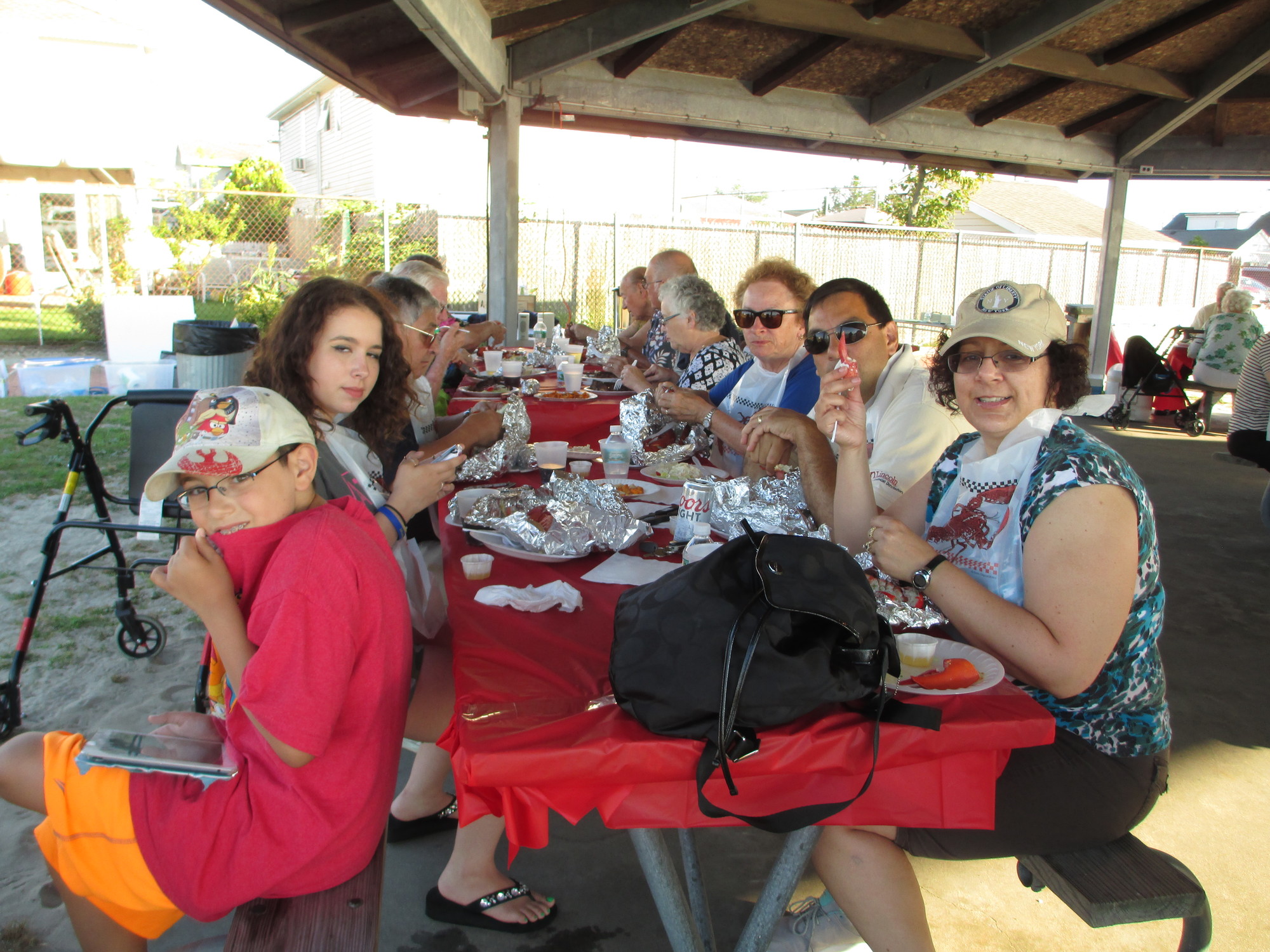 Members of 
several Kiwanis clubs in the Long Island Southwest Division enjoy the feast at the Island Park Kiwanis event.