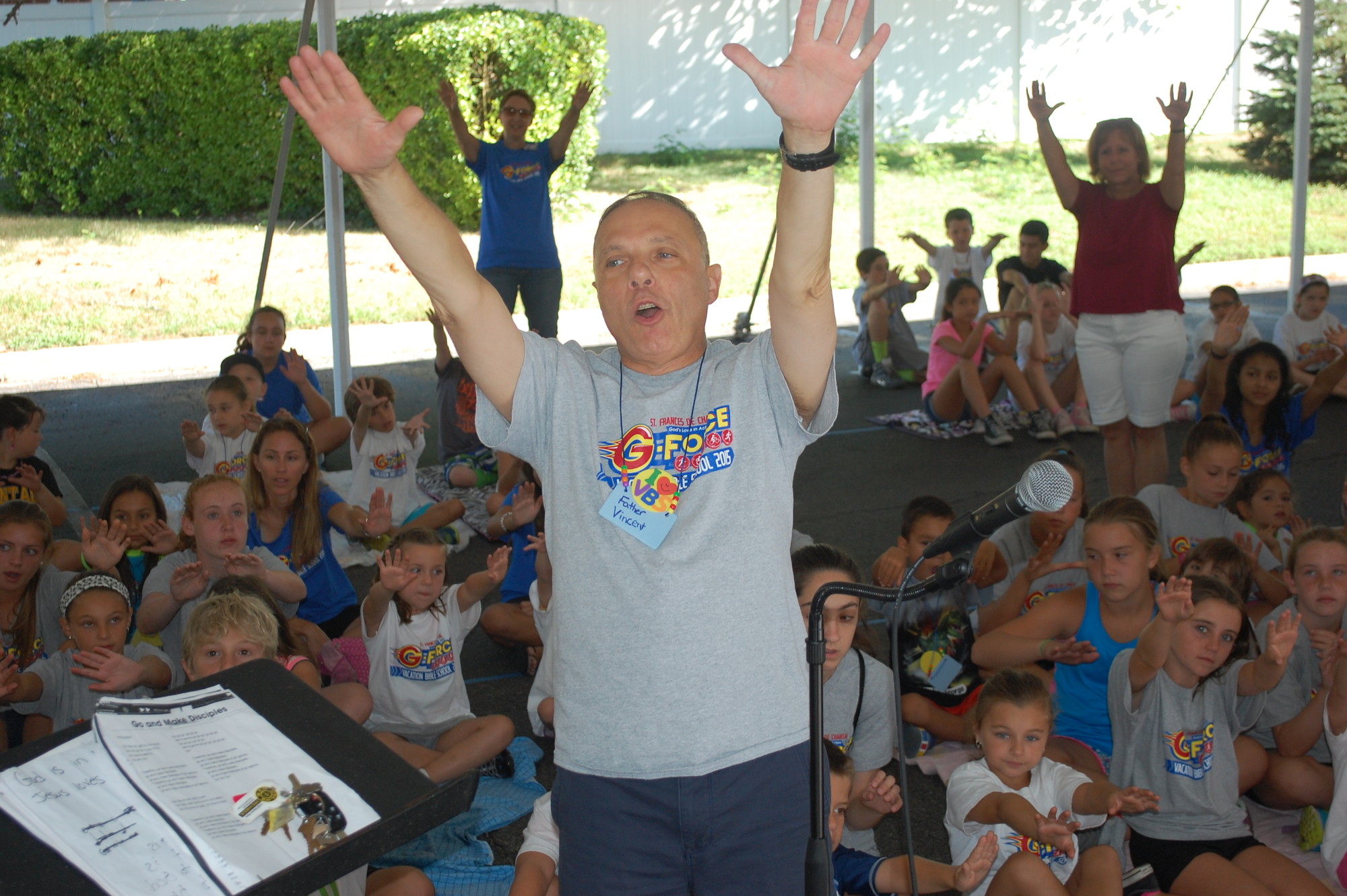 The Rev. Vincent Schifano led campers in prayer at St. Frances de Chantal’s annual vacation Bible school last week.