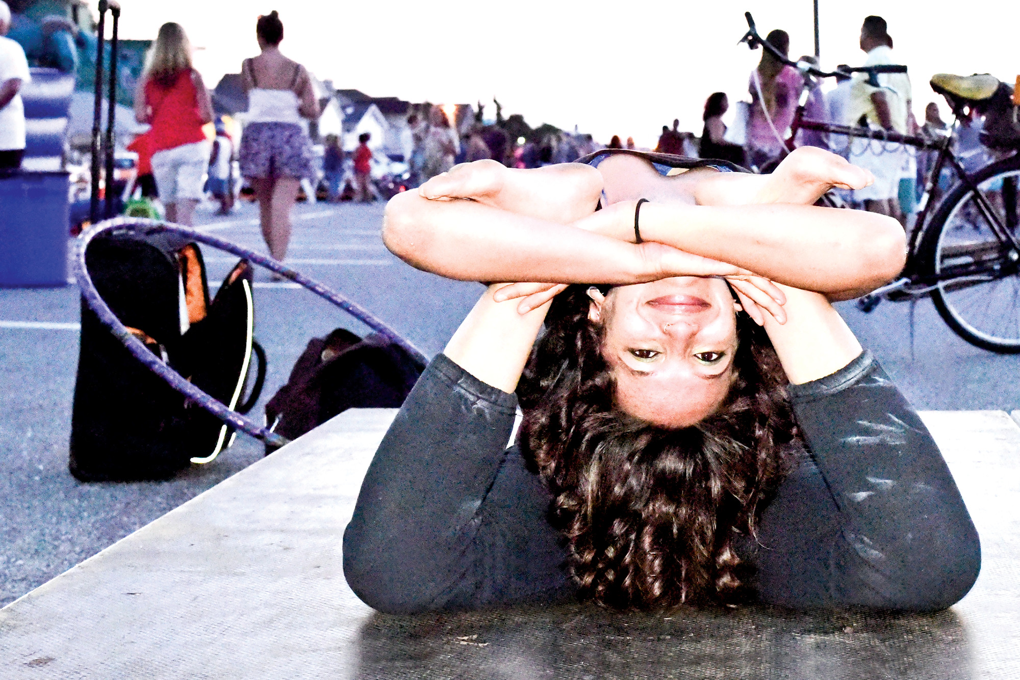 Shipra Saraogi — a contortionist and fire-eater — entertained spectators at the Sunset Celebration event on Saturday.