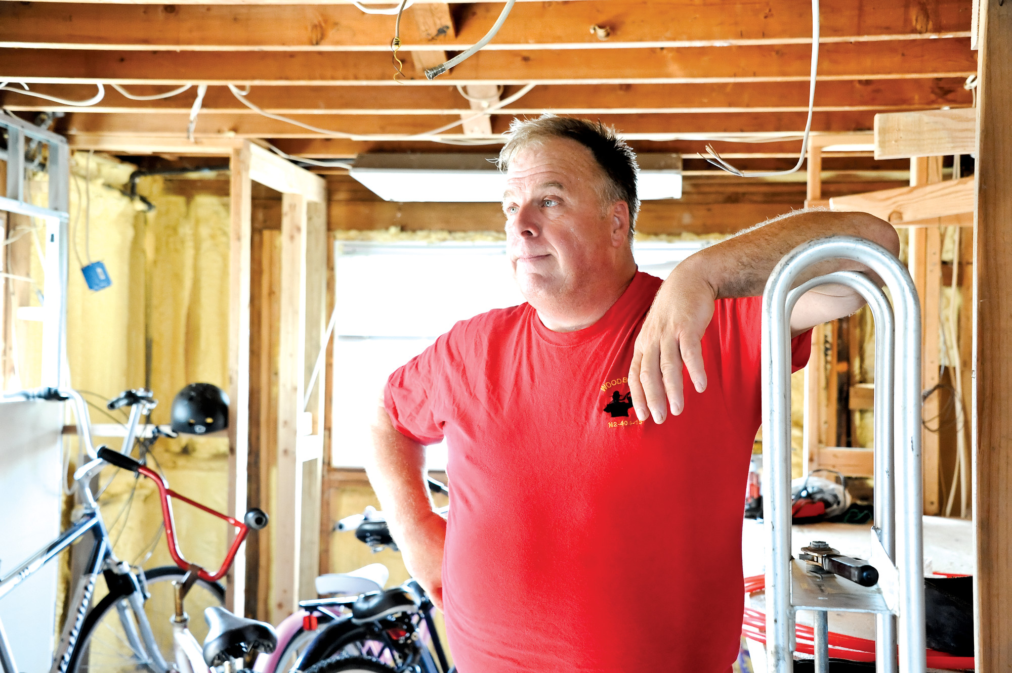 Local plumber James Snow, who is still struggling to repair the damage his East State Street home sustained in Hurricane Sandy, received assistance last week from State Assemblyman Todd Kaminsky and Rebuilding Together Long Island.
