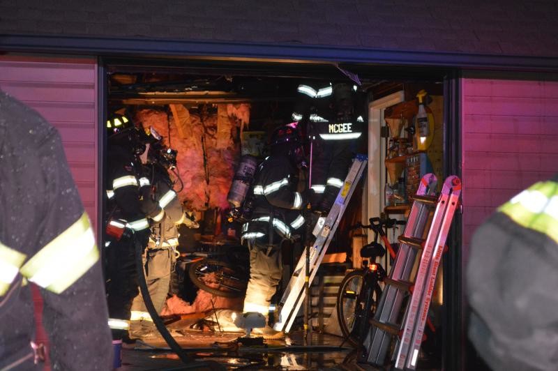 East Meadow firefighters extinguished a garage fire on Flagstone Lane in Westbury on Aug. 9.