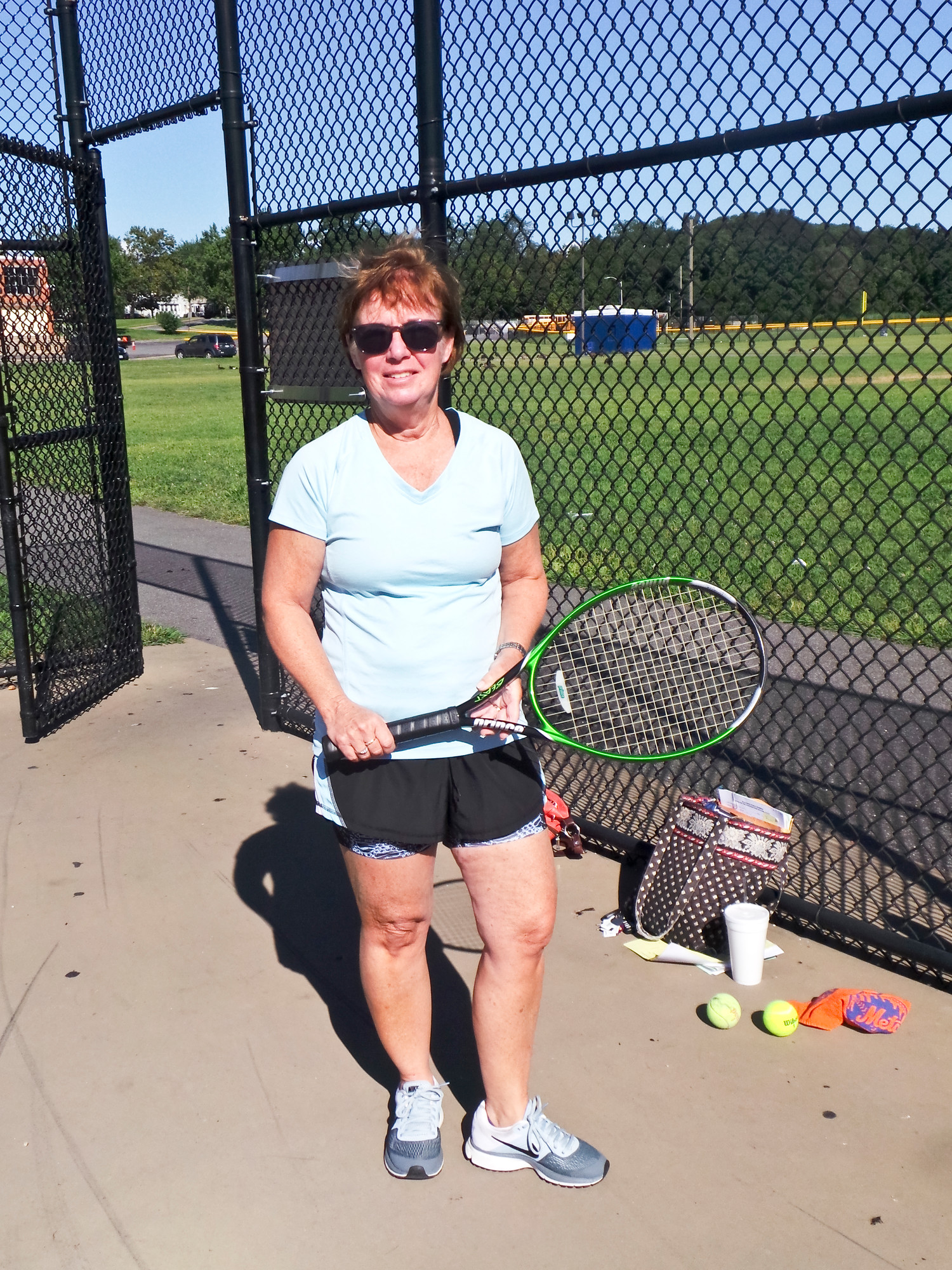 patti Ward, a nurse in the Malverne school district for 25 years, has been coaching the high school tennis team for the past four years.
