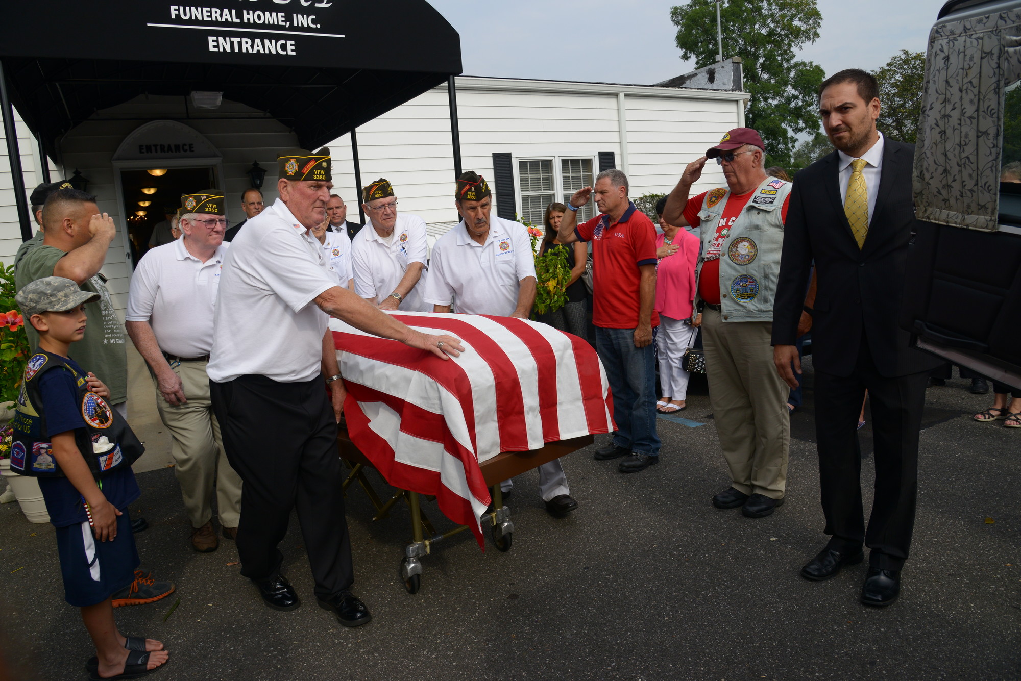 Members of VFW 3350, from East Rockaway, served as pallbearers at the funeral for Angel Gallant. (Penny Frondelli/Herald)
