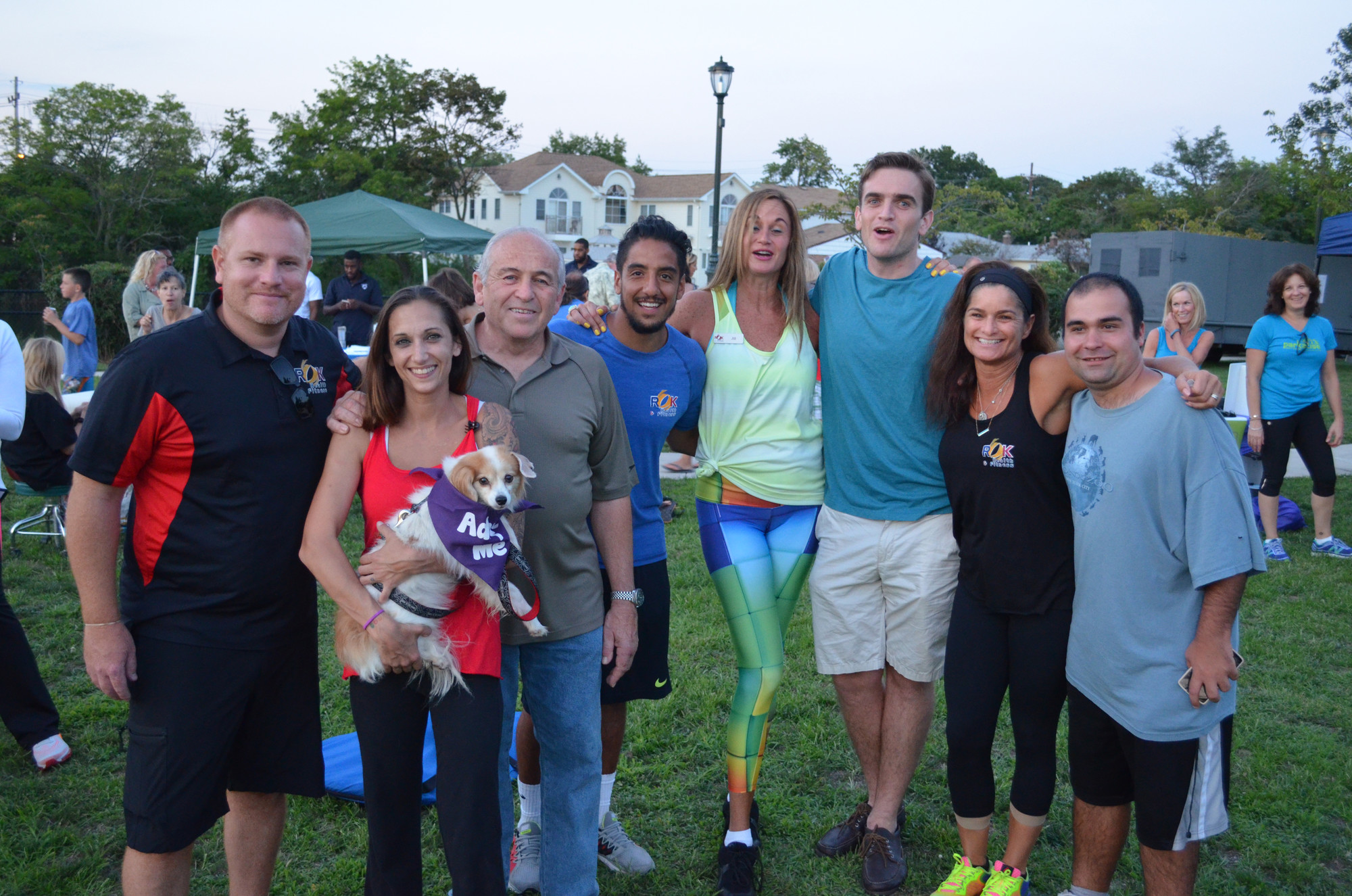 ROK Health & fitness owners and staff welcomed residents to the festival. Pictured from left were Michael Hawksby, Krista Risolo (holding Norman the dog), Robert D’Urso, Juan Cano, Jill Markowski, Craig D’Urso, Megan Griffo and Michael Lumi.
