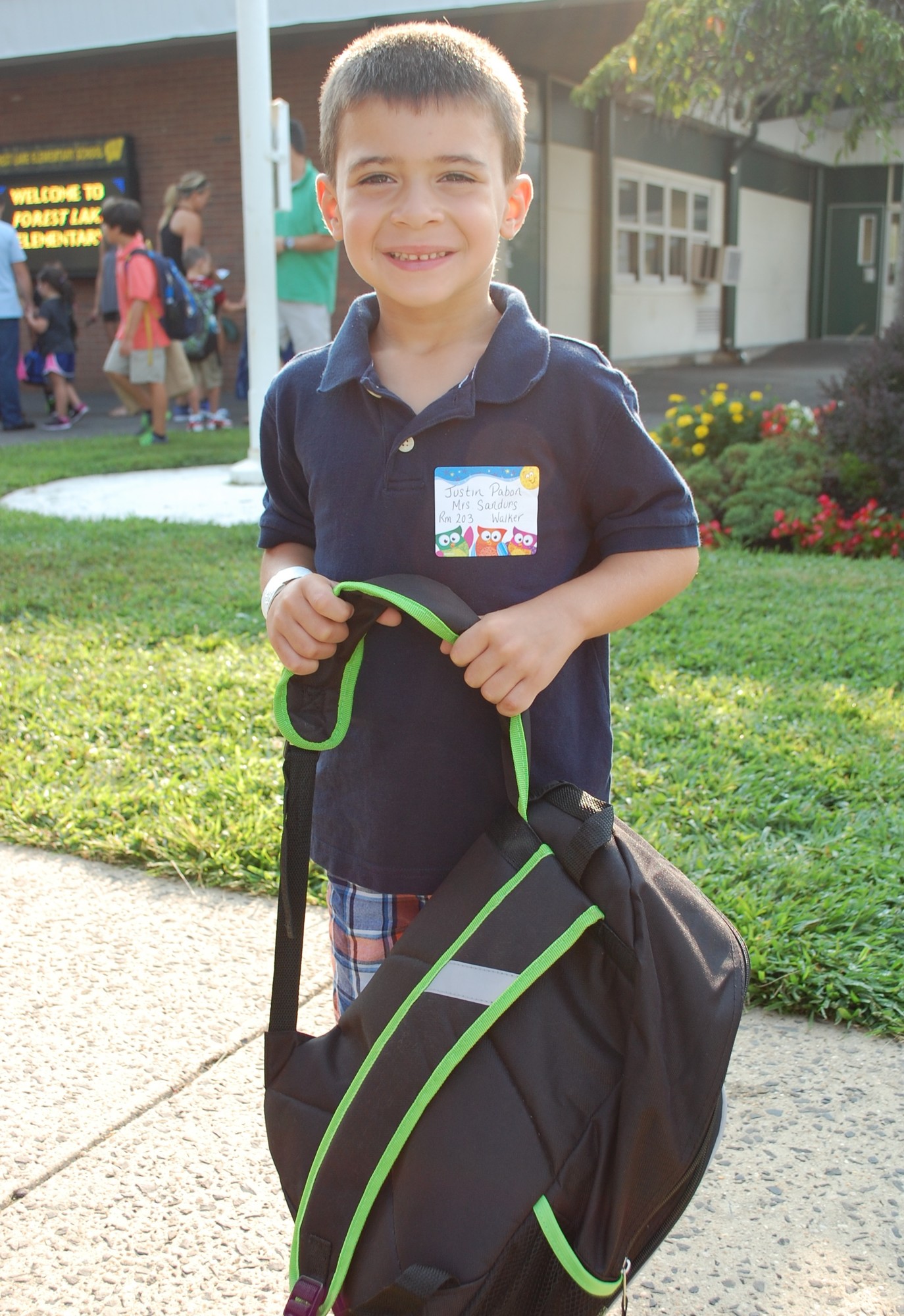 Justin Pabon started his first day of kindergarten at Forest Lake Elementary School.