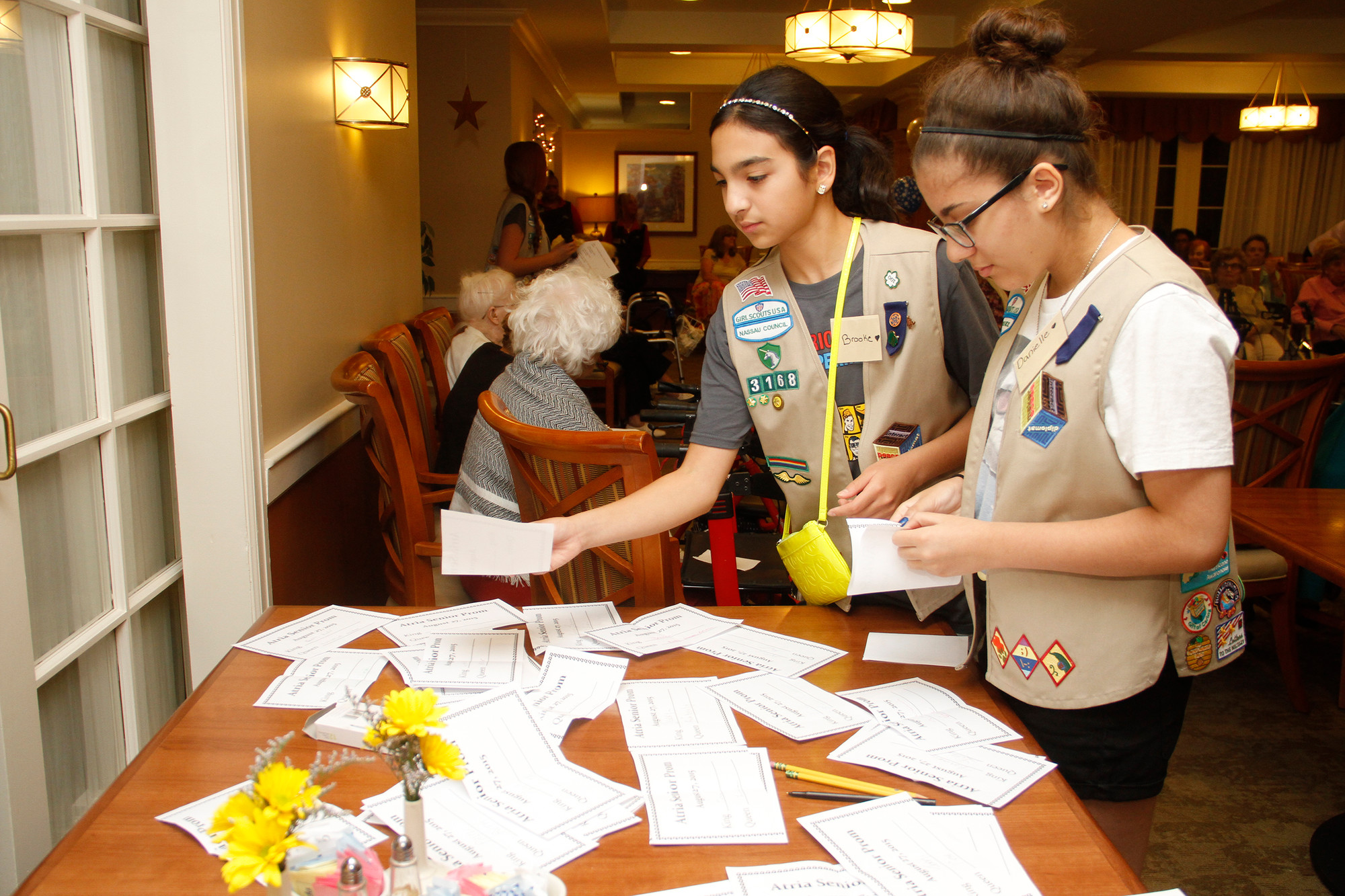 Scouts Brooke Gallo and Danielle Mascolo volunteered their time.
