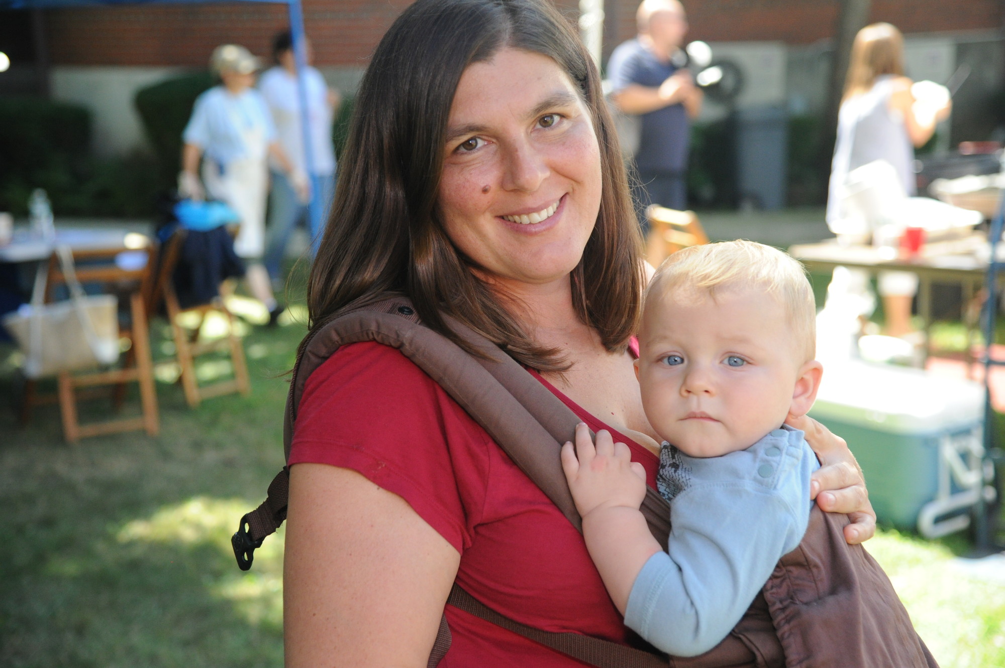 One of the festival’s youngest attendees, Luke, 10 months old, with his mother, Denise Kraus.
