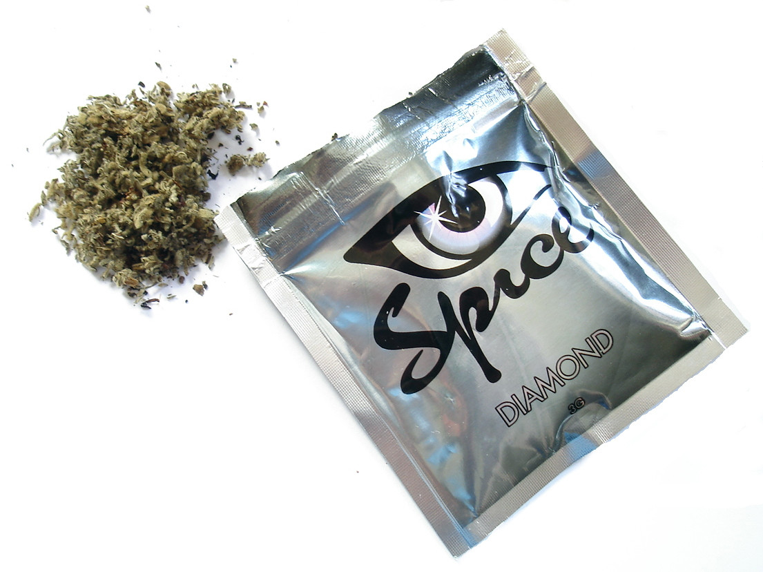 Side effects of K2, a street name for synthetic marijuana, include rapid heart rate, vomiting, agitation, confusion, and hallucinations. It can also induce seizures and fainting.