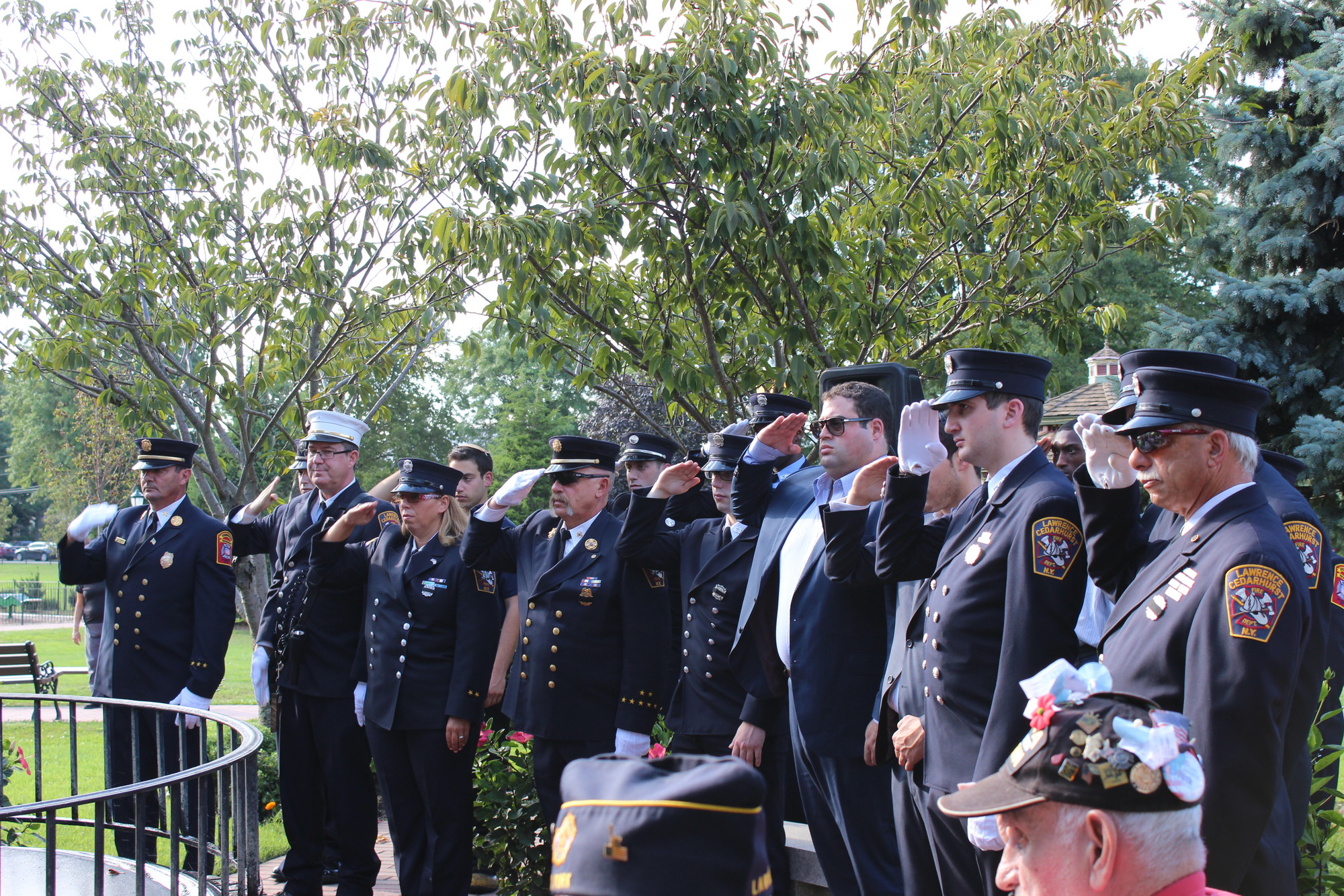 The Lawrence-Cedarhurst Fire Department raised their right hands to salute those who lost their lives on 9/11.