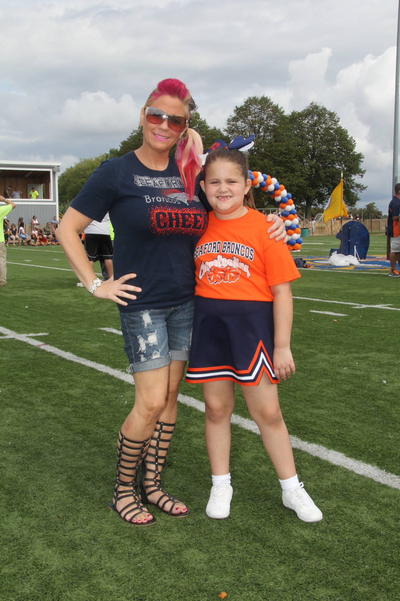 Justine LaVolpe with her daughter, Gia, 8, a Broncos cheerleader.