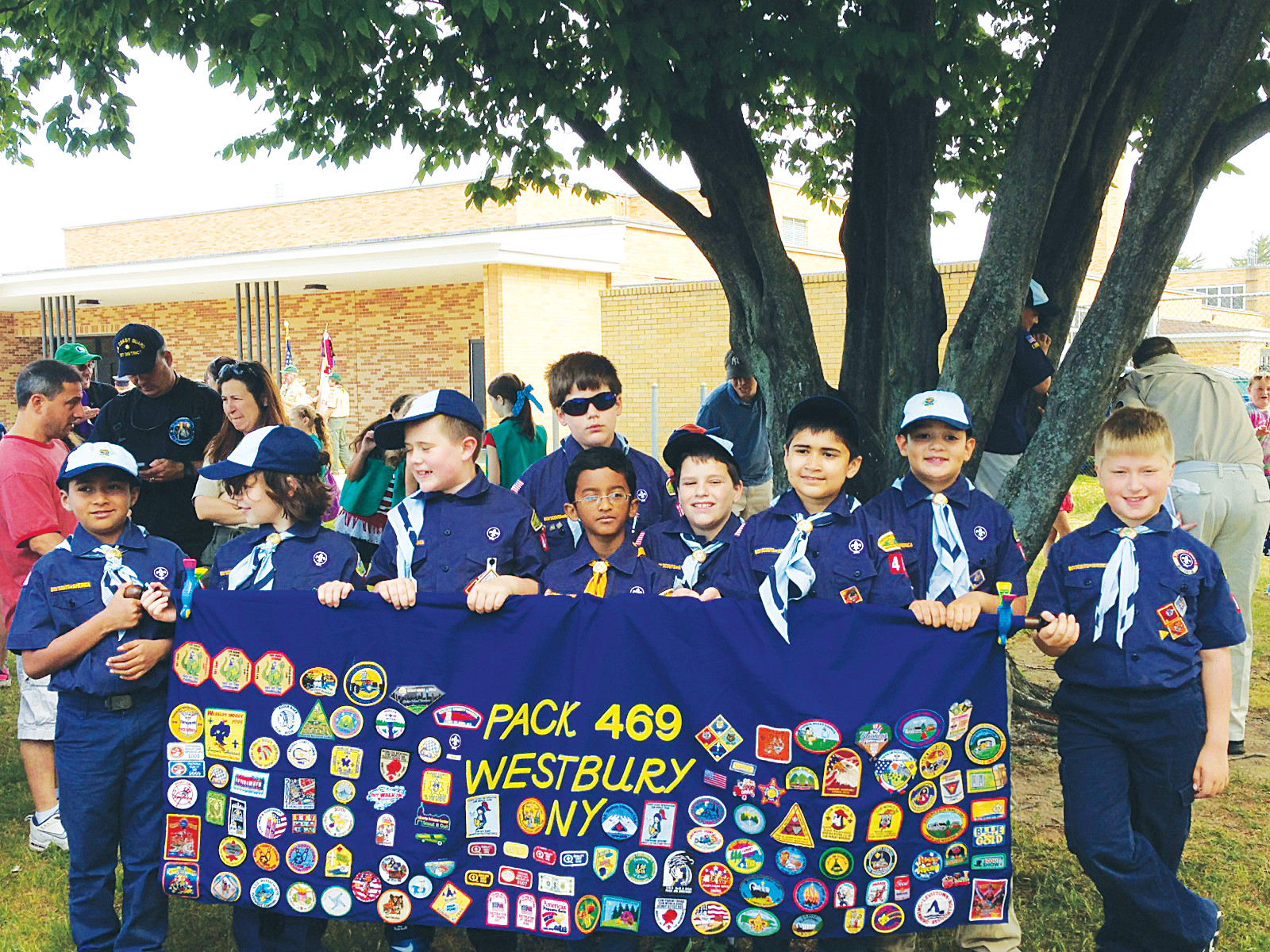 Cub Scout Pack 469 in last May’s East Meadow Memorial Day parade. The pack is seeking new recruits for its Sept. 25 kick-off meeting.