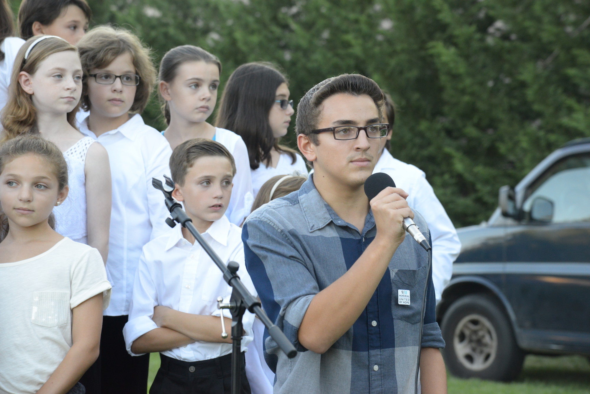 OHS student Dean Klebonas sang the National Anthem.