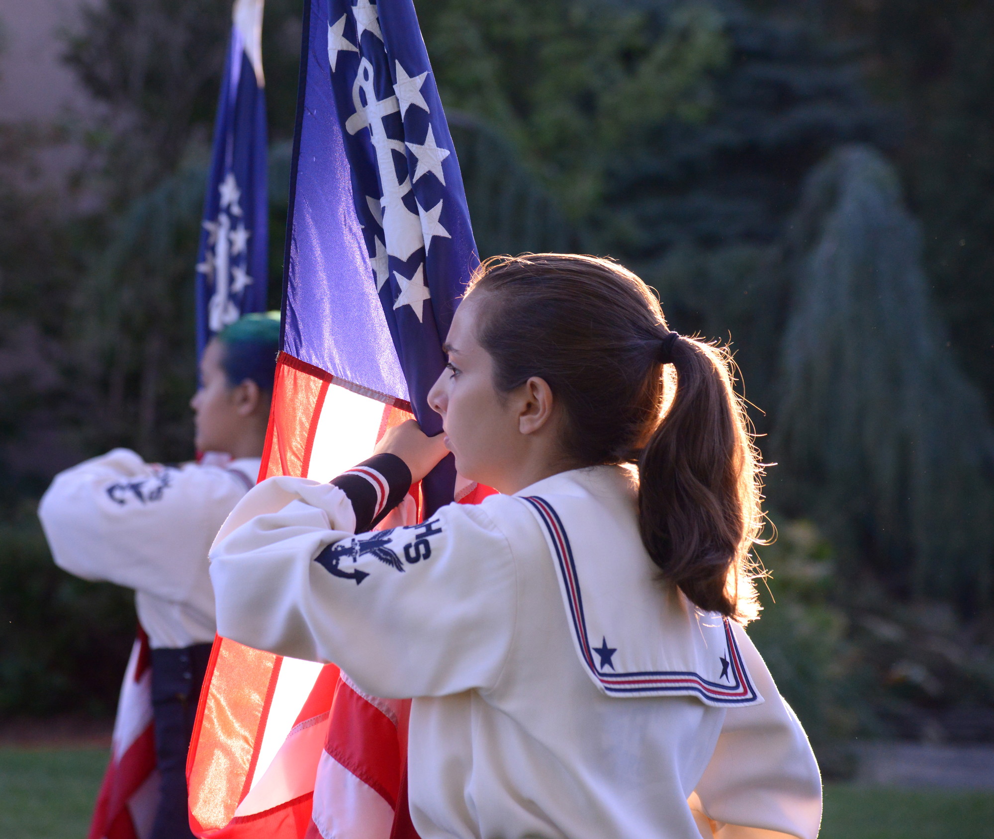 Gabriella Campielli of the marching band held her flag up high. (Penny Frondelli/Herald)