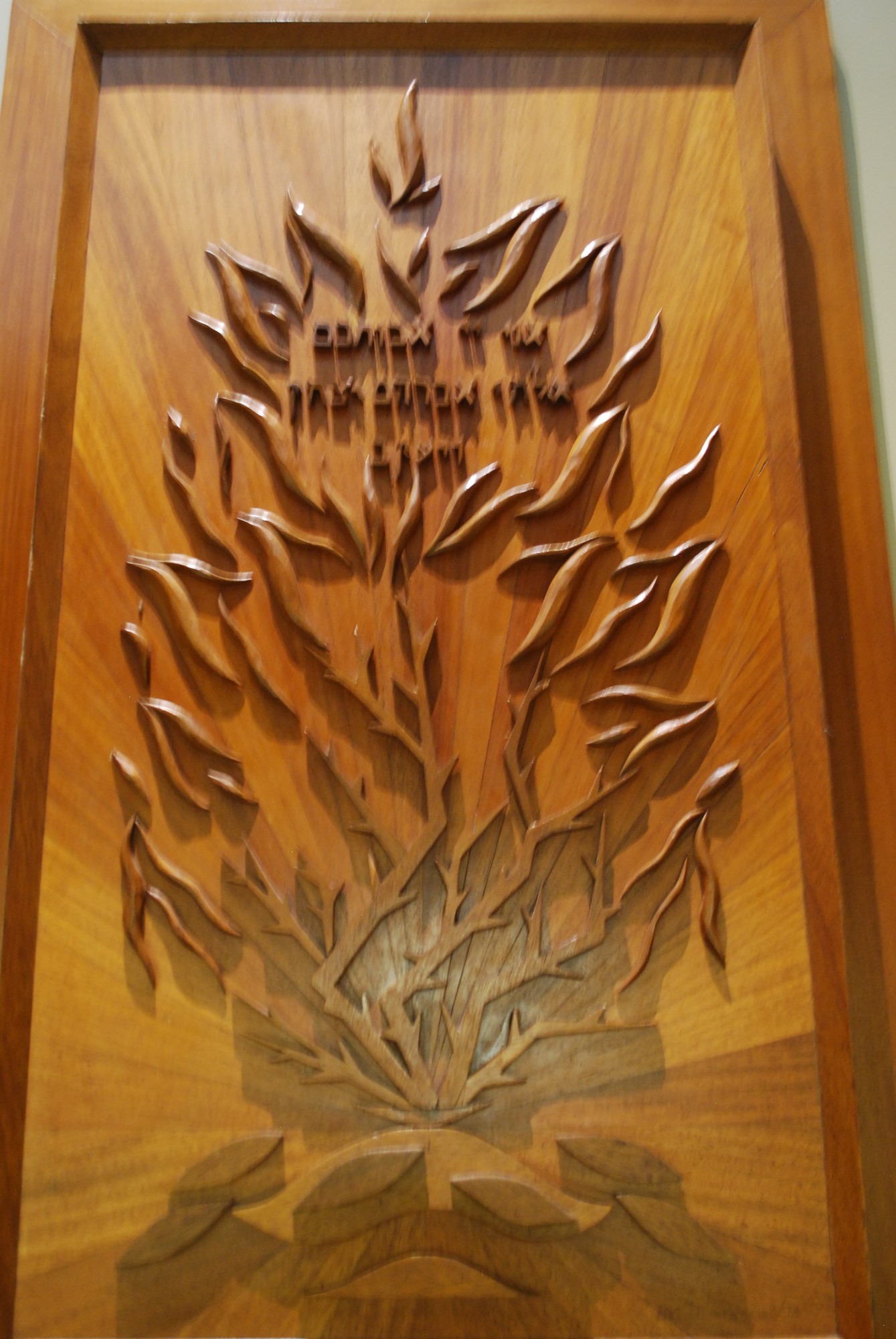 Nat Haister carved “The Burning Bush” displayed at Temple Am Echad.