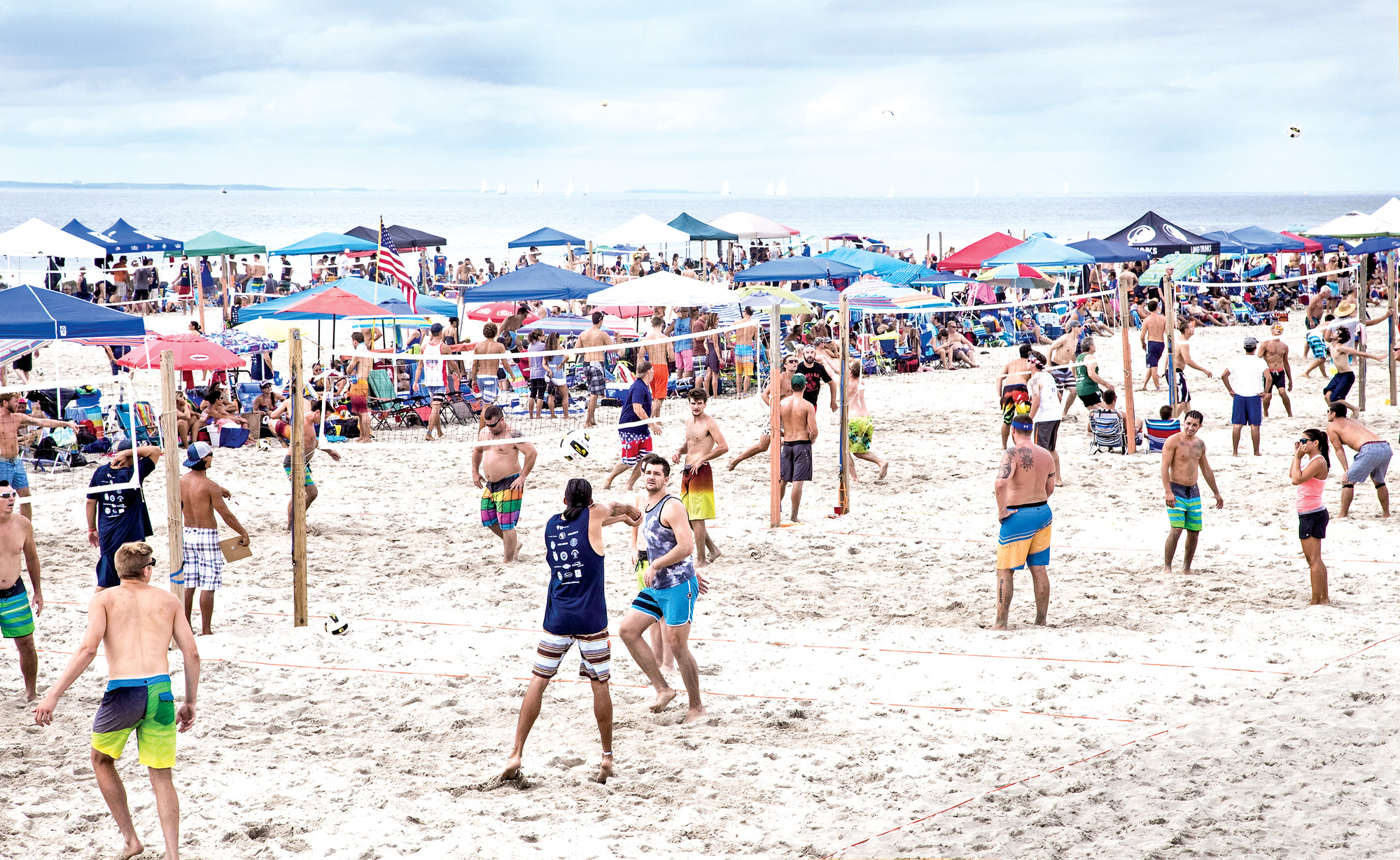 Photos by Kristie Arden/Herald 
The beach was packed for this year’s Michelle O’Neill volleyball tournament despite the threat of rain.