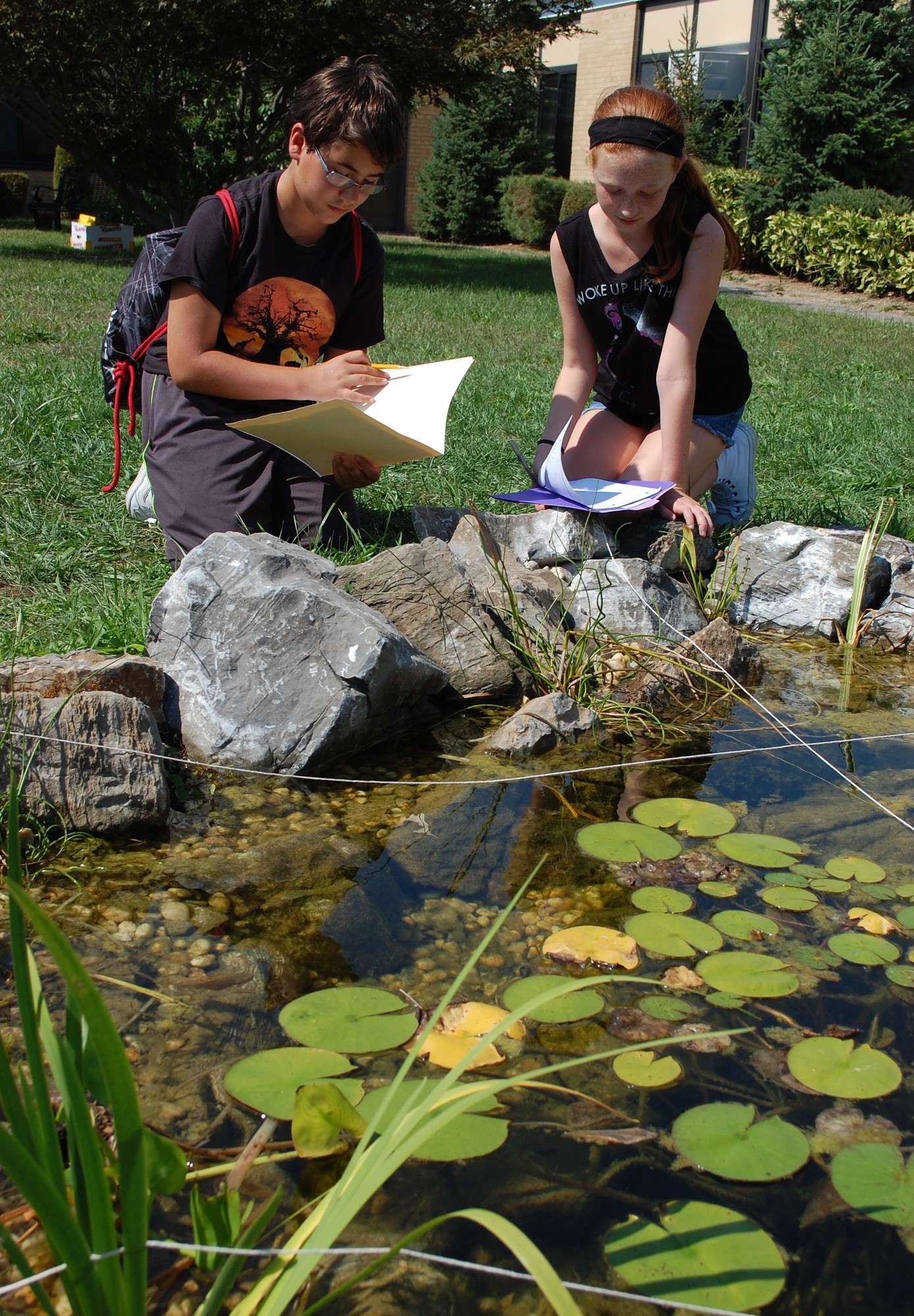 Seventh-graders Nick Logozzo and Julie Magliano looked at the pond and made observations.