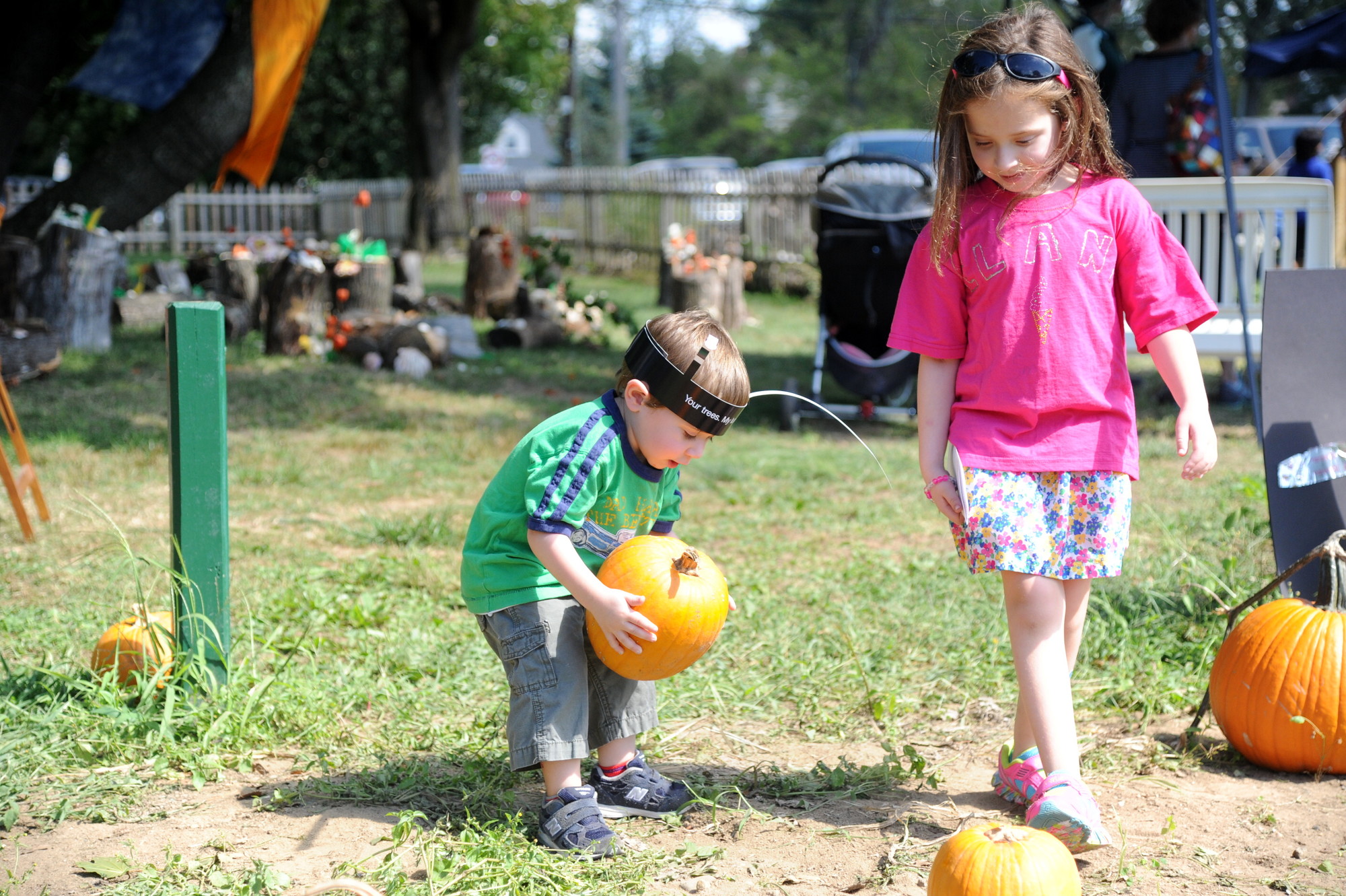 Adam Cohen, 3, and his sister Elana, 7, picked their favorite pumpkins.