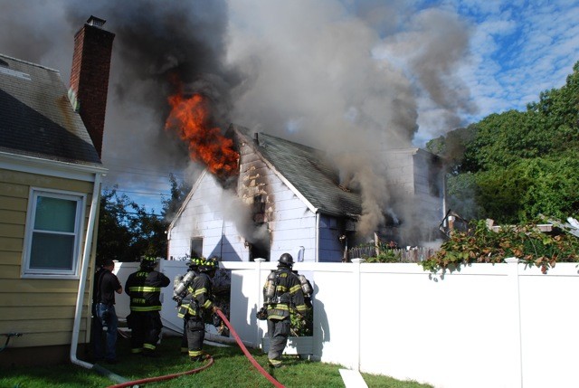 The Wednesday morning fire was at 355 Chestnut Avenue. Some 100 firefighters responded to the blaze, said East Meadow Fire Department Chief James Kane.