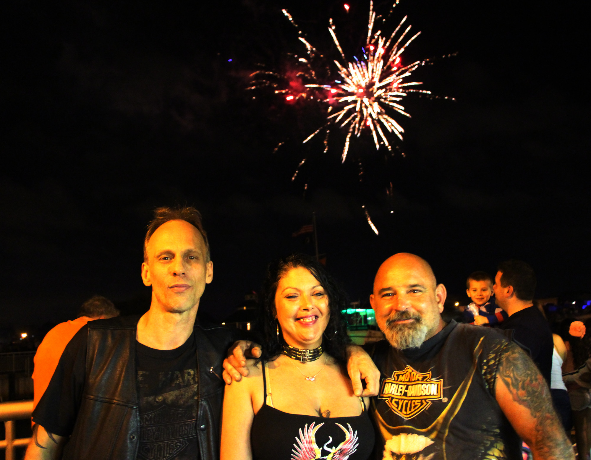Glenn Mielinis with his wife Rhea and their friend Michael Homan were enjoying the fireworks.