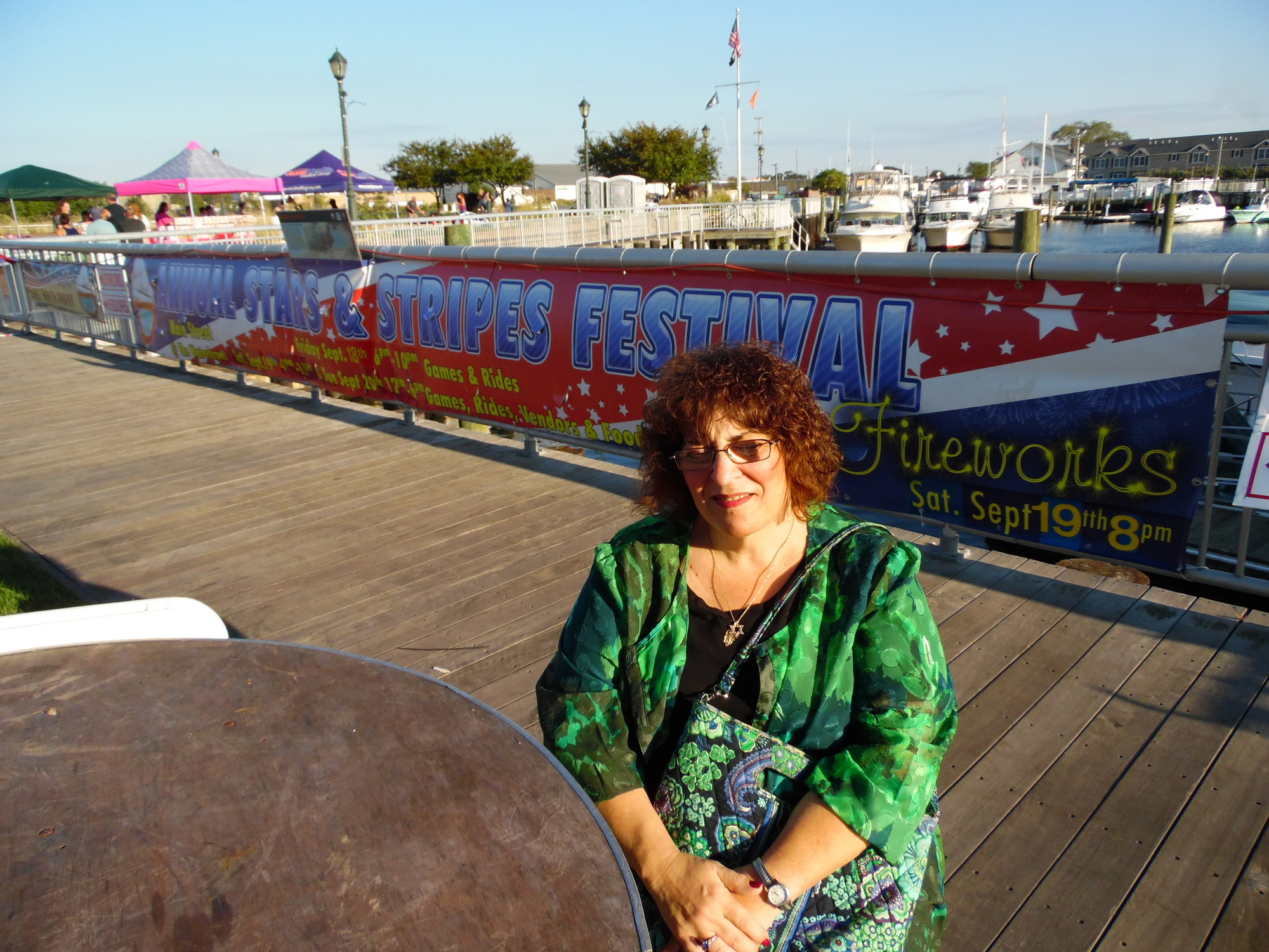 Linda Bakal, of East Rockaway, took a break during the fair.
