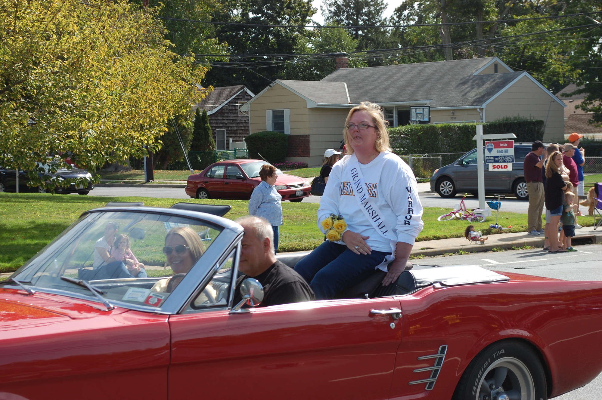 Kathy Cahill, the district's director of science and technology education, was named grand marshal.