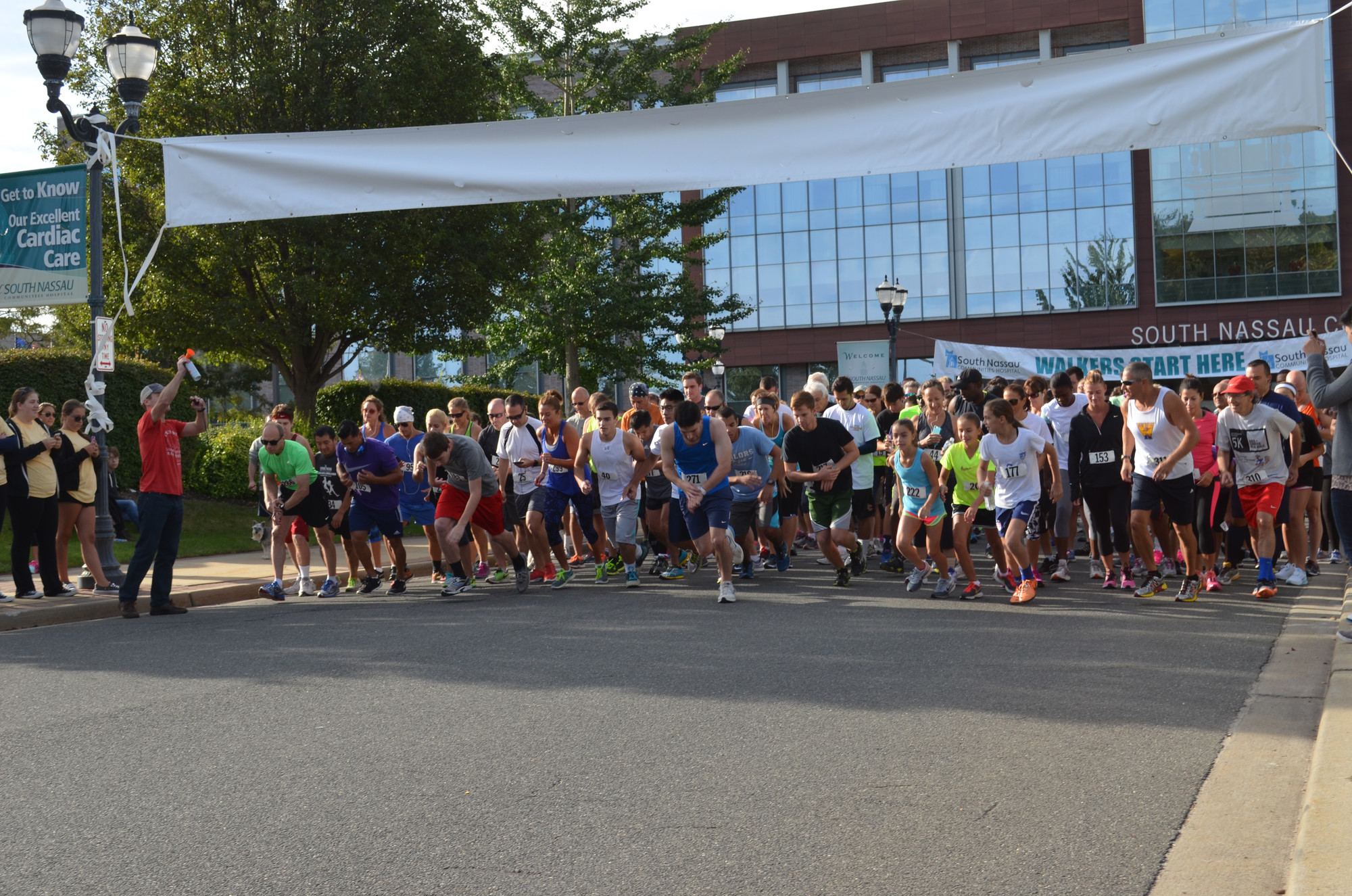 And they’re off at the start of the South Nassau Communities Hospital 5k Run/Walk. (Tim Baker/Herald)