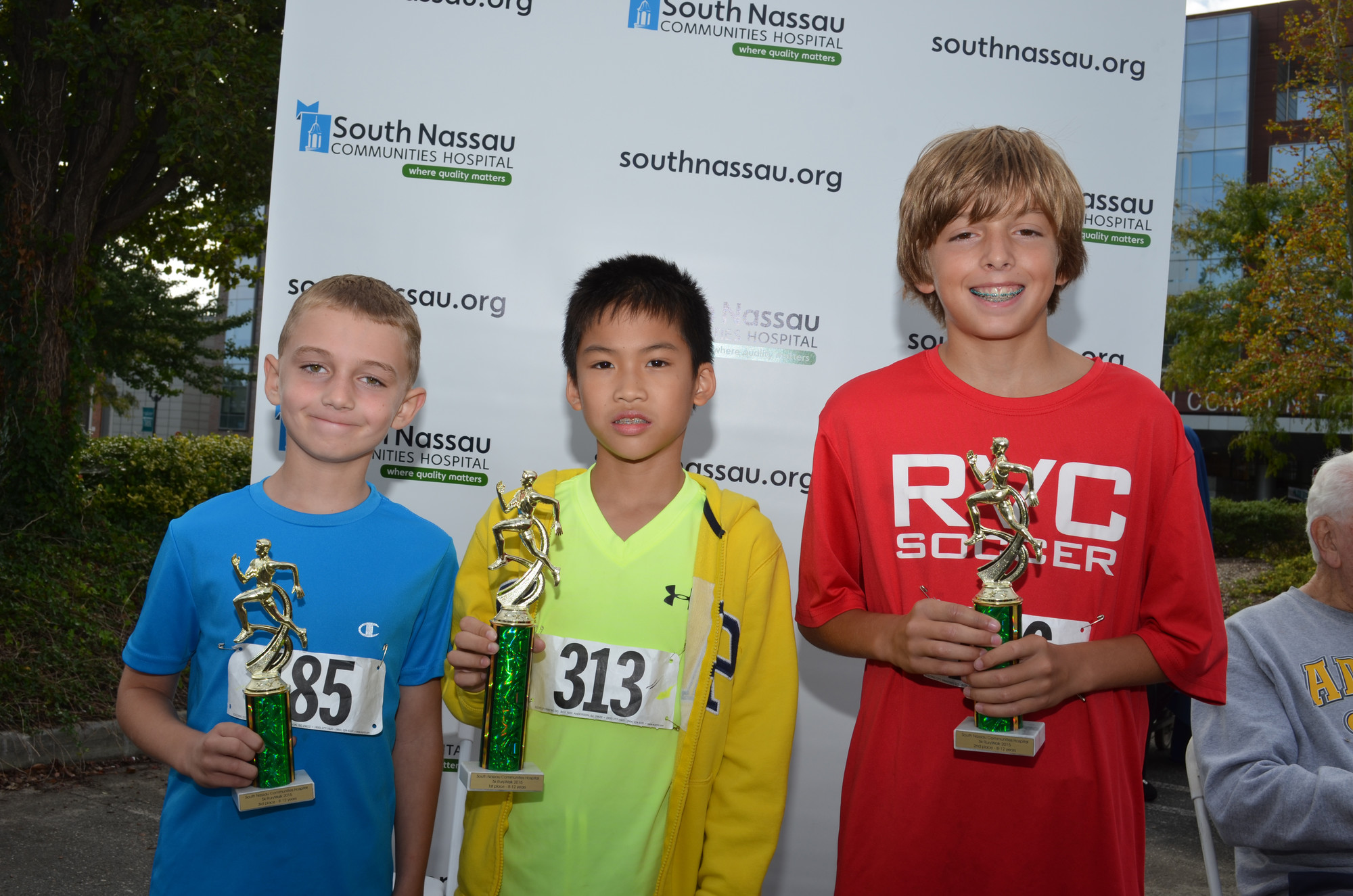 Winners from their age group: From left: Third place William Miller 8, first place Aidan Ke 9 and second place Owen Mraz 12.