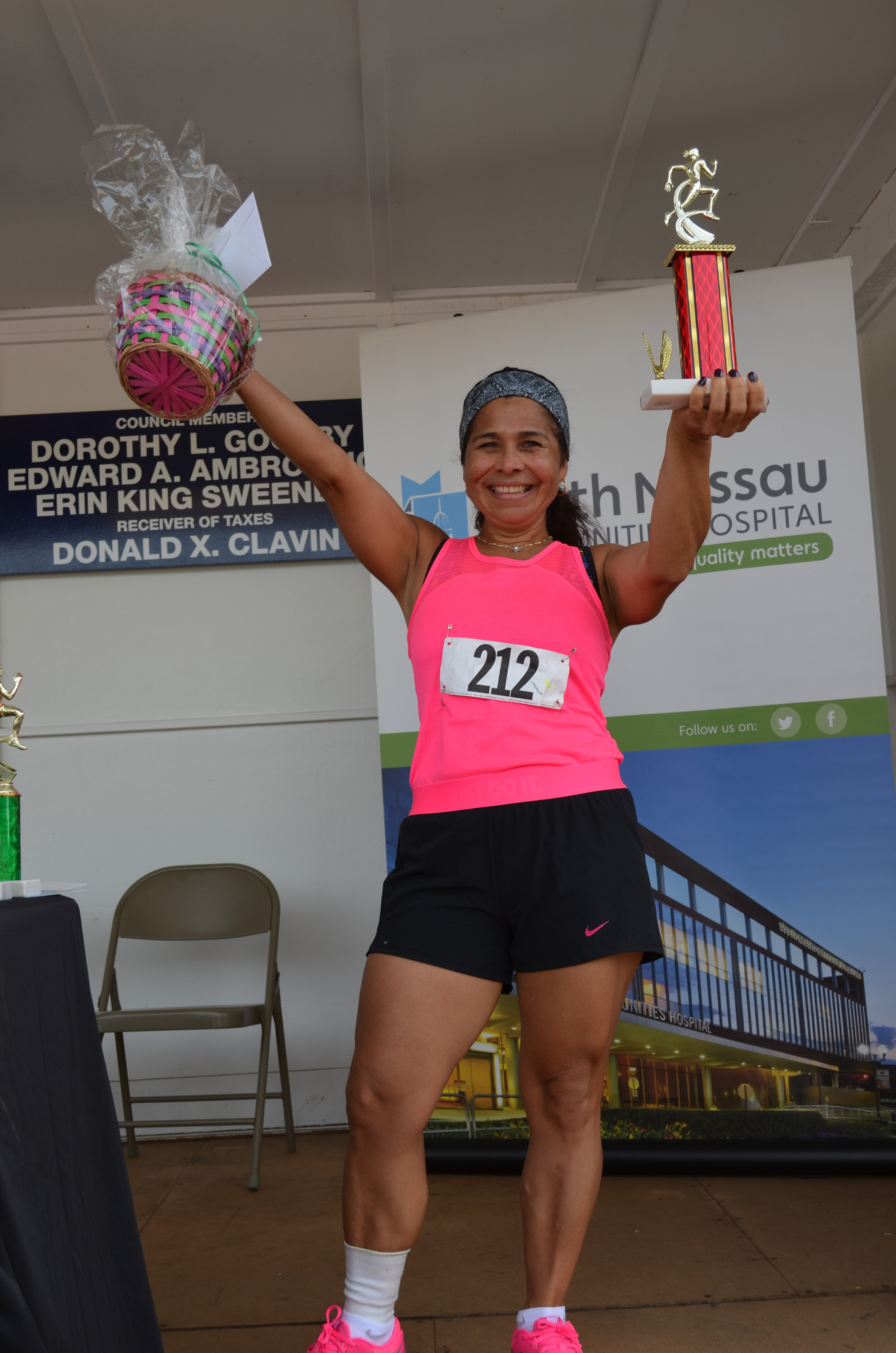 Lilian Reyes of Island Park with her awards. She finished 1st in her age group.