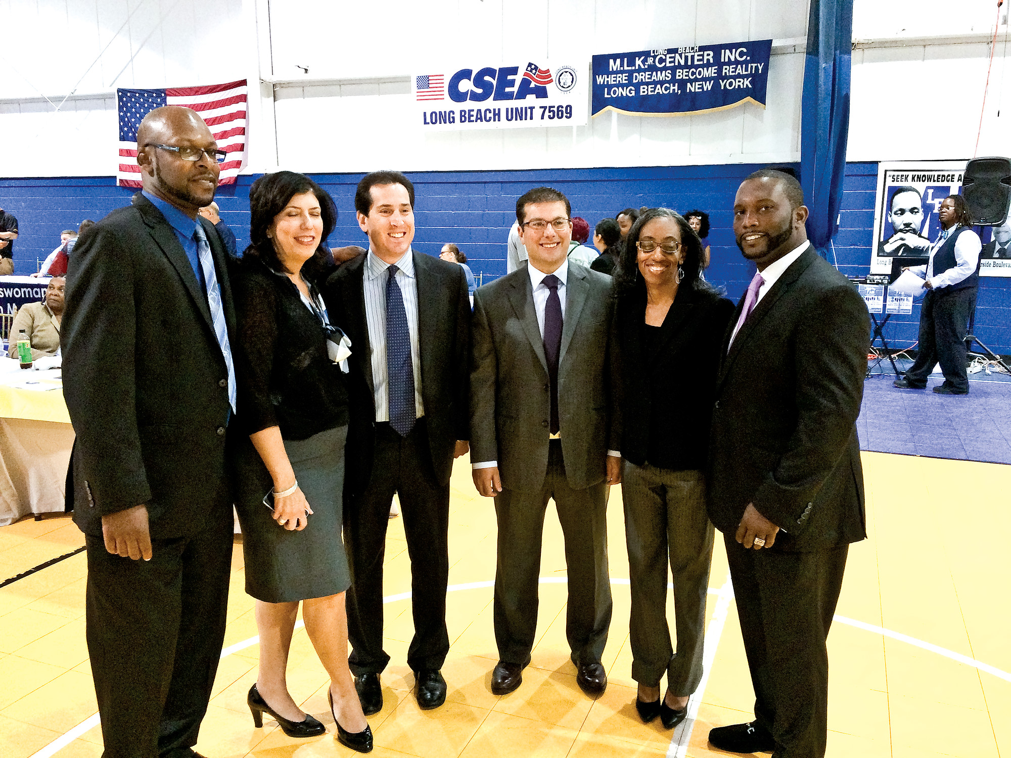 Matthew Ern/Herald
Event organizer Marcus Tinker, far left, acting Nassau County District Attorney Madeline Singas, State Assemblyman Todd Kaminsky, City Manager Jack Schnirman, City Council candidate Anissa Moore and Martin Luther King Center Chairman James Hodge at last week’s job fair.