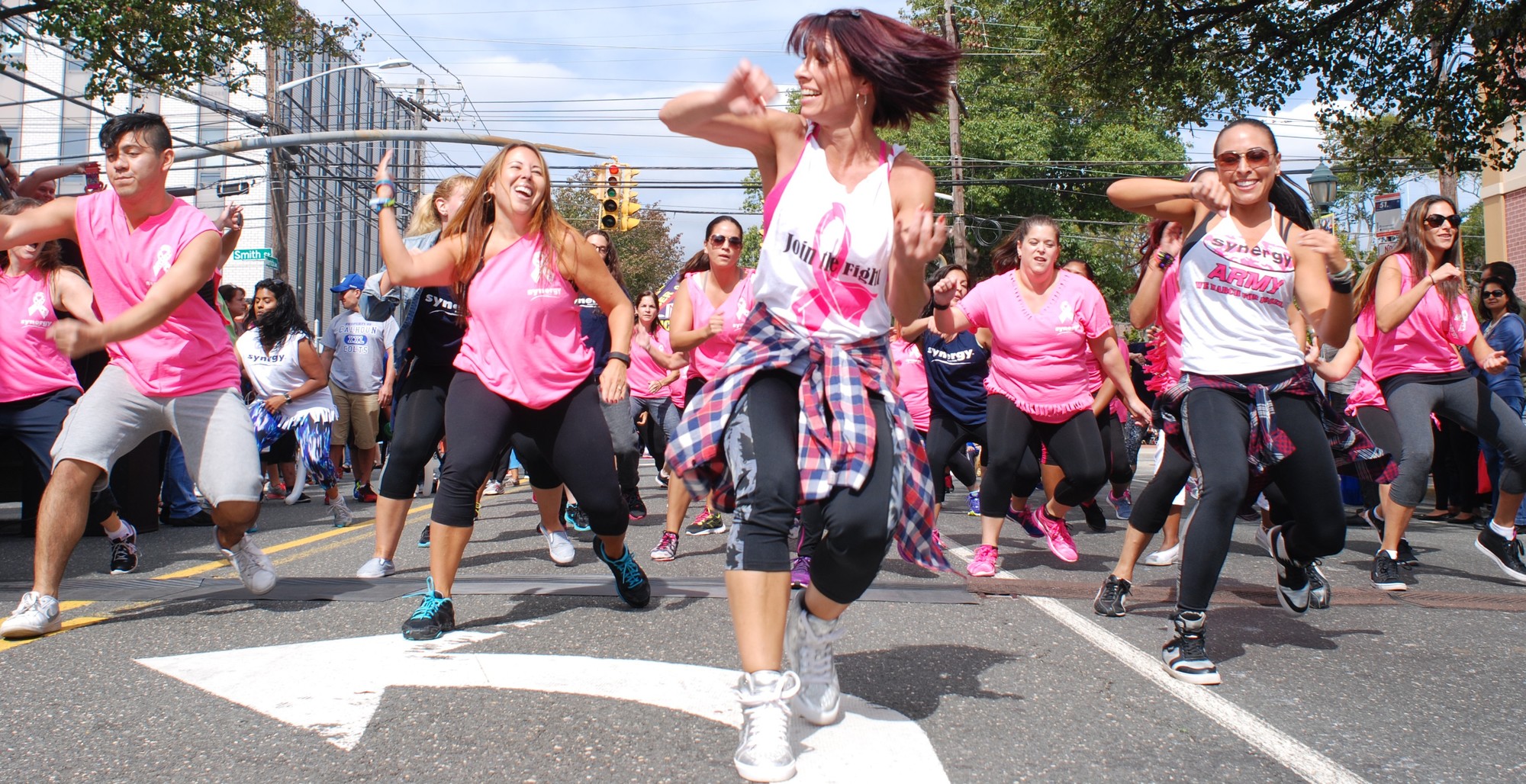 Valerie Sanzone, a trainer and instructor at Synergy Fitness in Merrick, led a flash mob of dancers last Sunday on Merrick Avenue at the Merrick Fall Festival, which was sponsored by the Chamber of Commerce. The festival attracted thousands of fair-goers from Sept. 25 to 27.