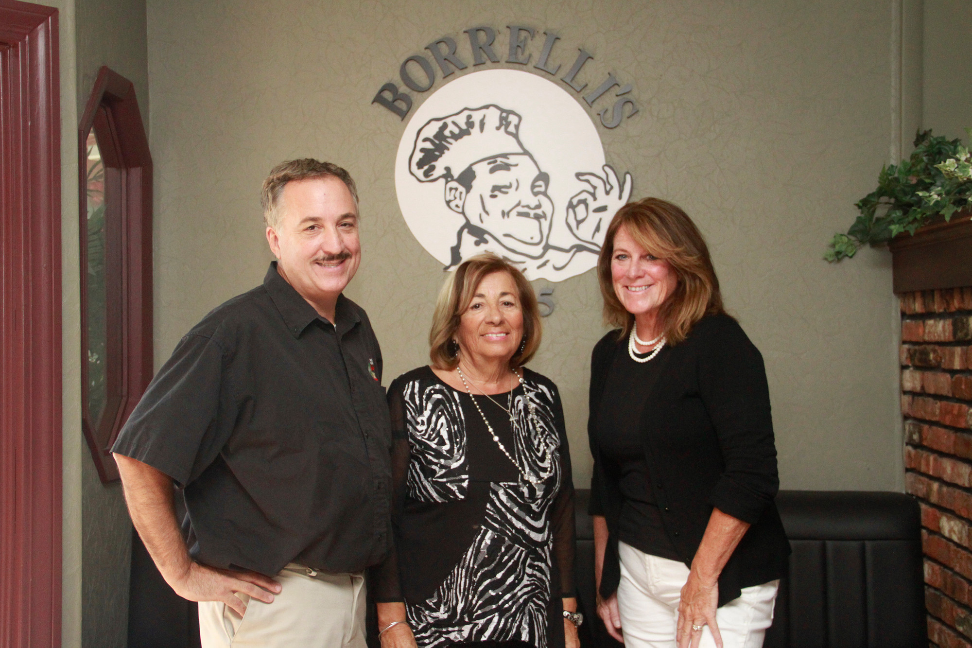 Borrelli's owners Frank Borrelli, Jr., his mother Katina Borrelli and wife Beth Borrelli.
