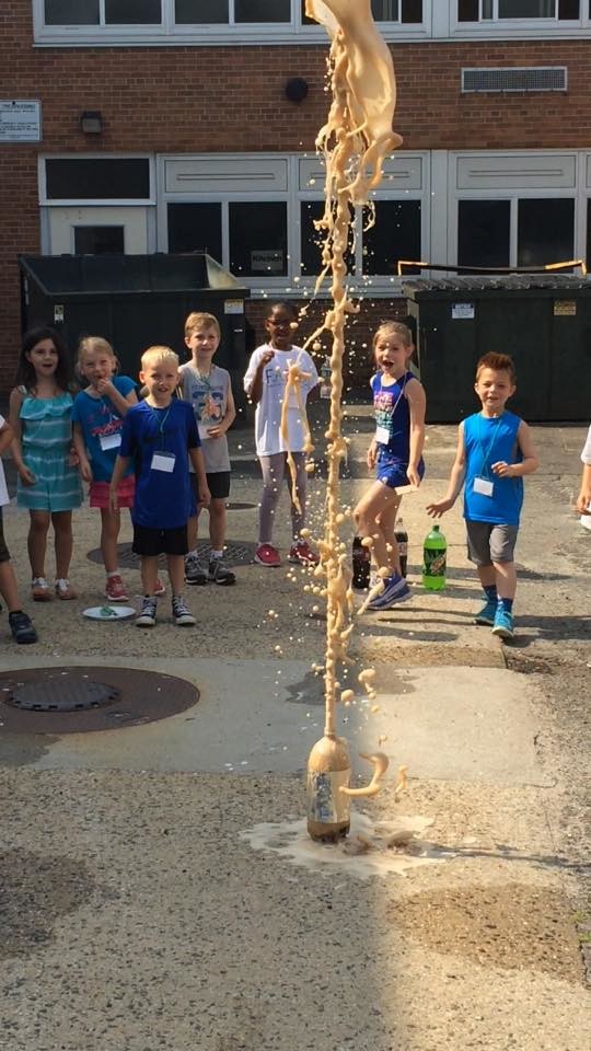 Children had a blast conducting a Coke-and-Mentos experiment in a “Cool Science” class this summer.
