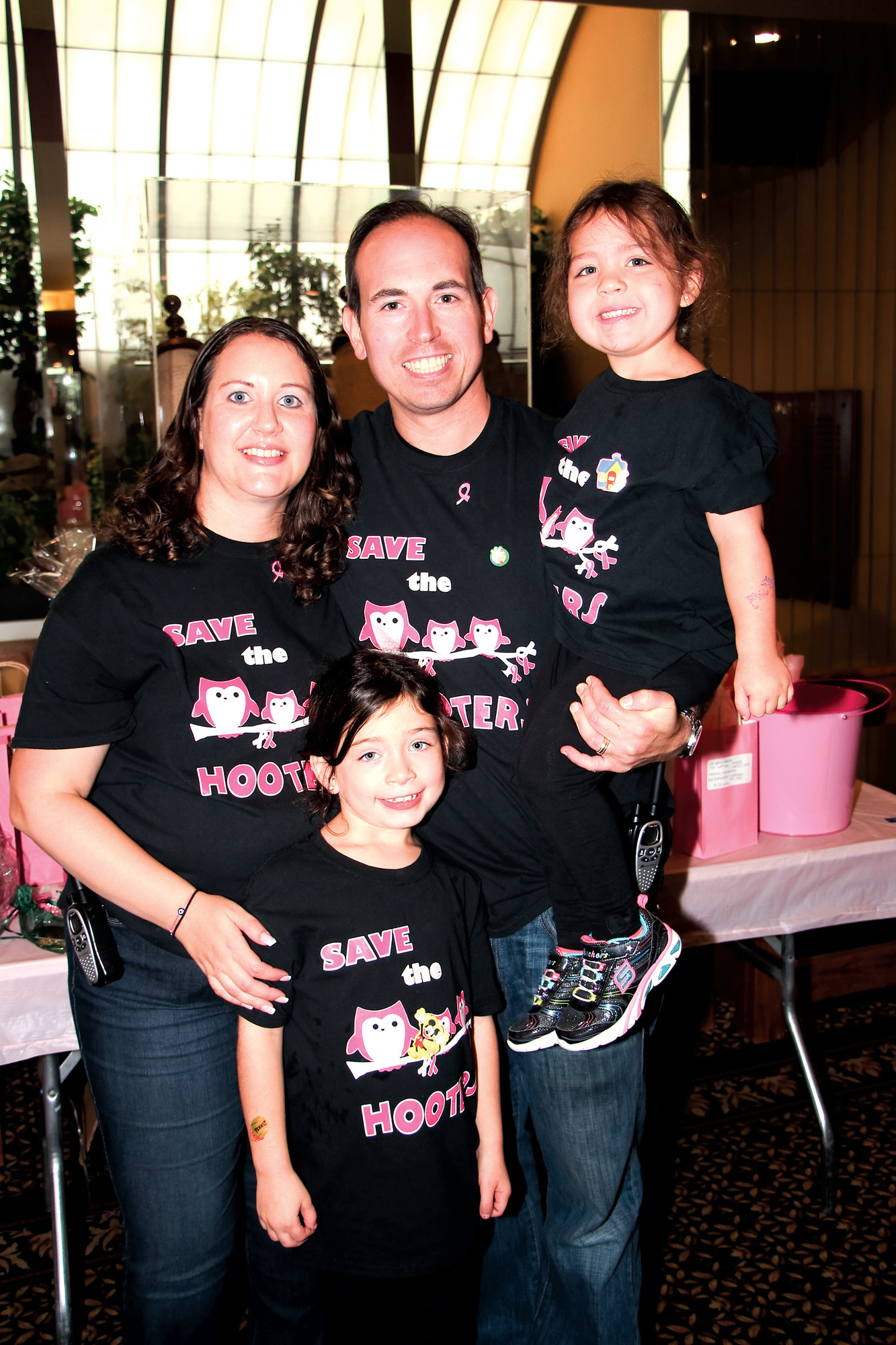 Robin Steinberger, a two-year breast cancer survivor who organized the event, with her husband Barry, and daughters, Jordyn, 7, left, and Brianna, 3.