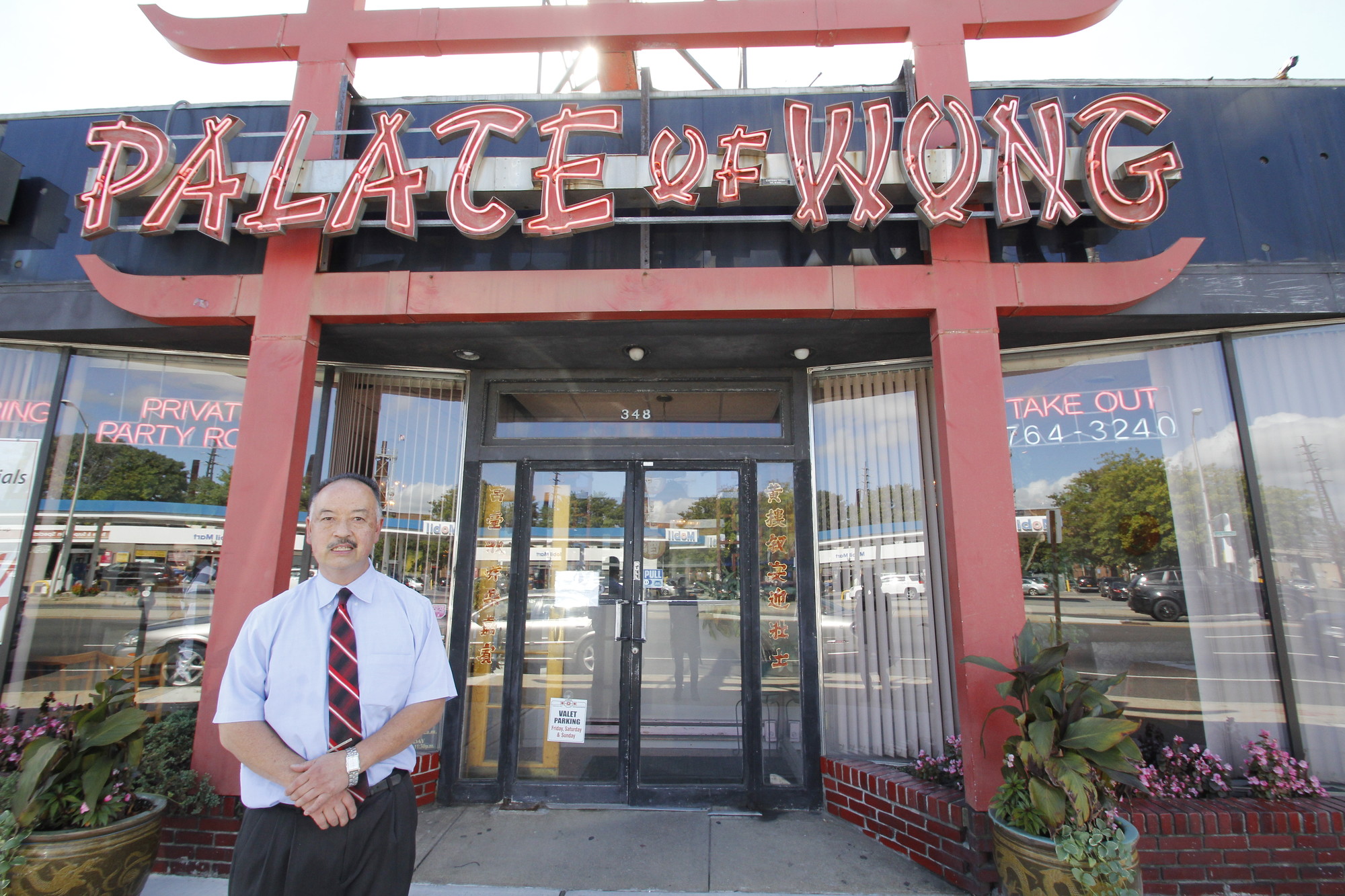 David Wong outside of the Rockville Centre restaurant that has been in his family since 1962. He told the Herald that he will close at the end of the month. (Christina Daly/Herald)