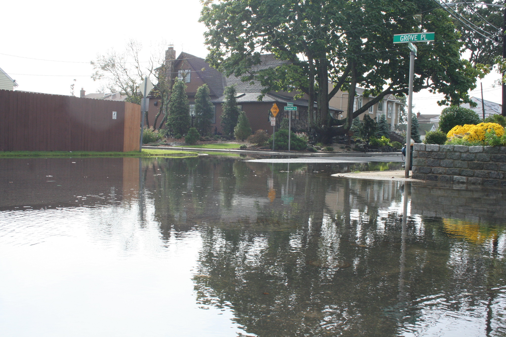 Flooding on Grove Place on Sept. 30. (Rebecca Rogak/Herald)
