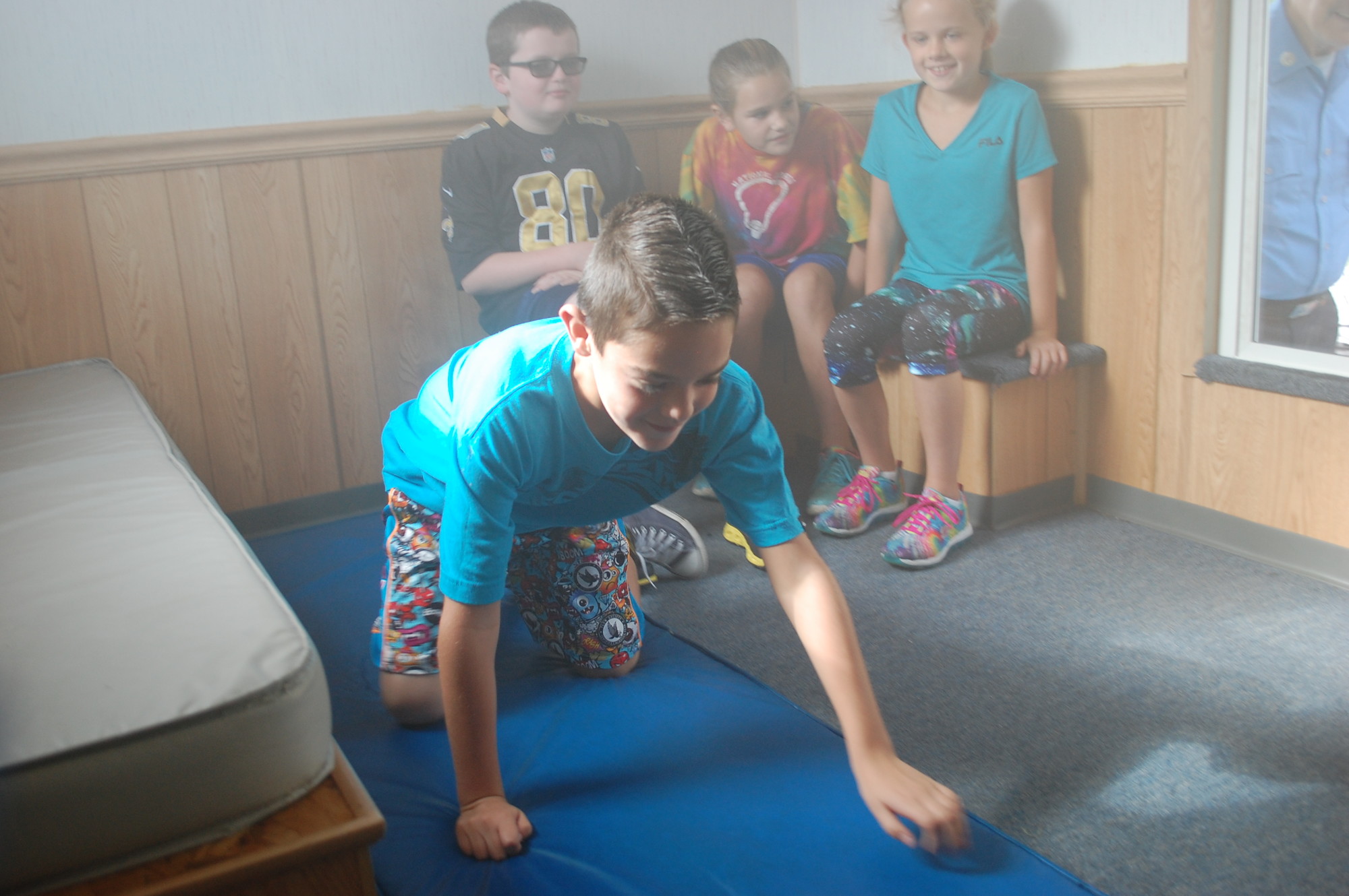 Forest Lake students learned to crawl low under the smoke.