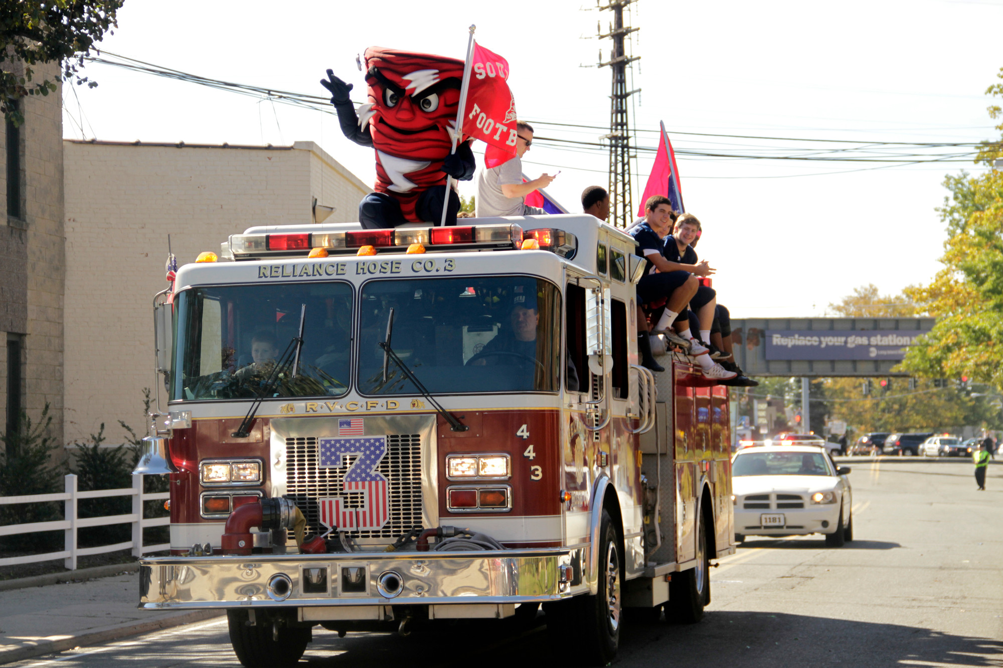 The South Side High School football team, and the school’s new mascot, rode atop an RVCFD truck during the high school’s Homecoming parade on Oct. 10. (Sue Grieco/Herald)