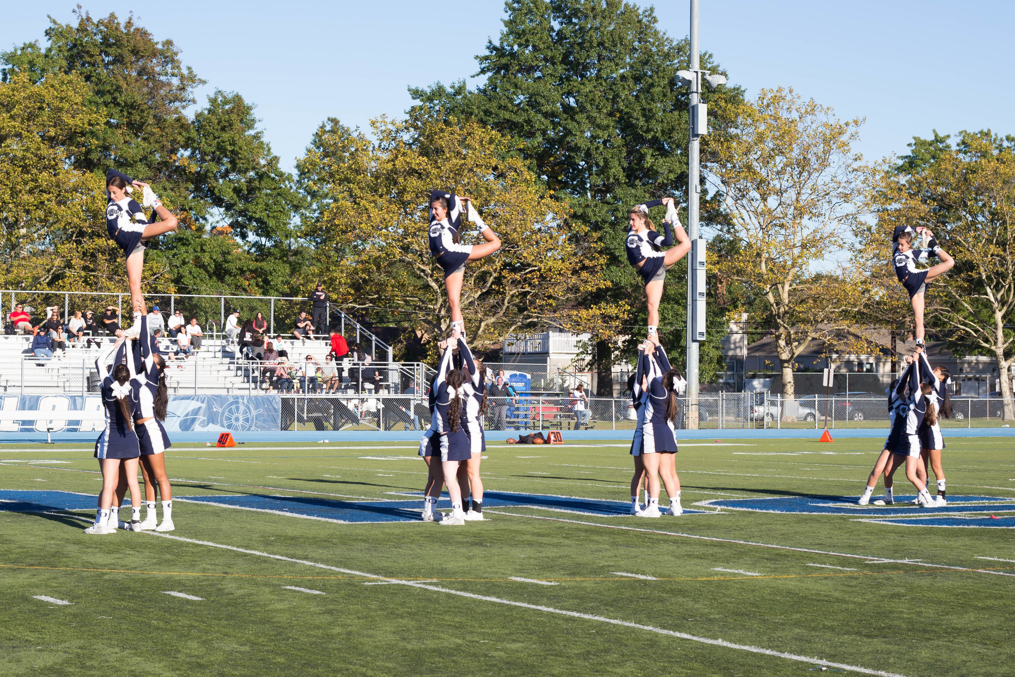Oceanside High School cheerleaders showed their school spirit on Oct. 10 at Homecoming. (Eric Dunetz/Herald)