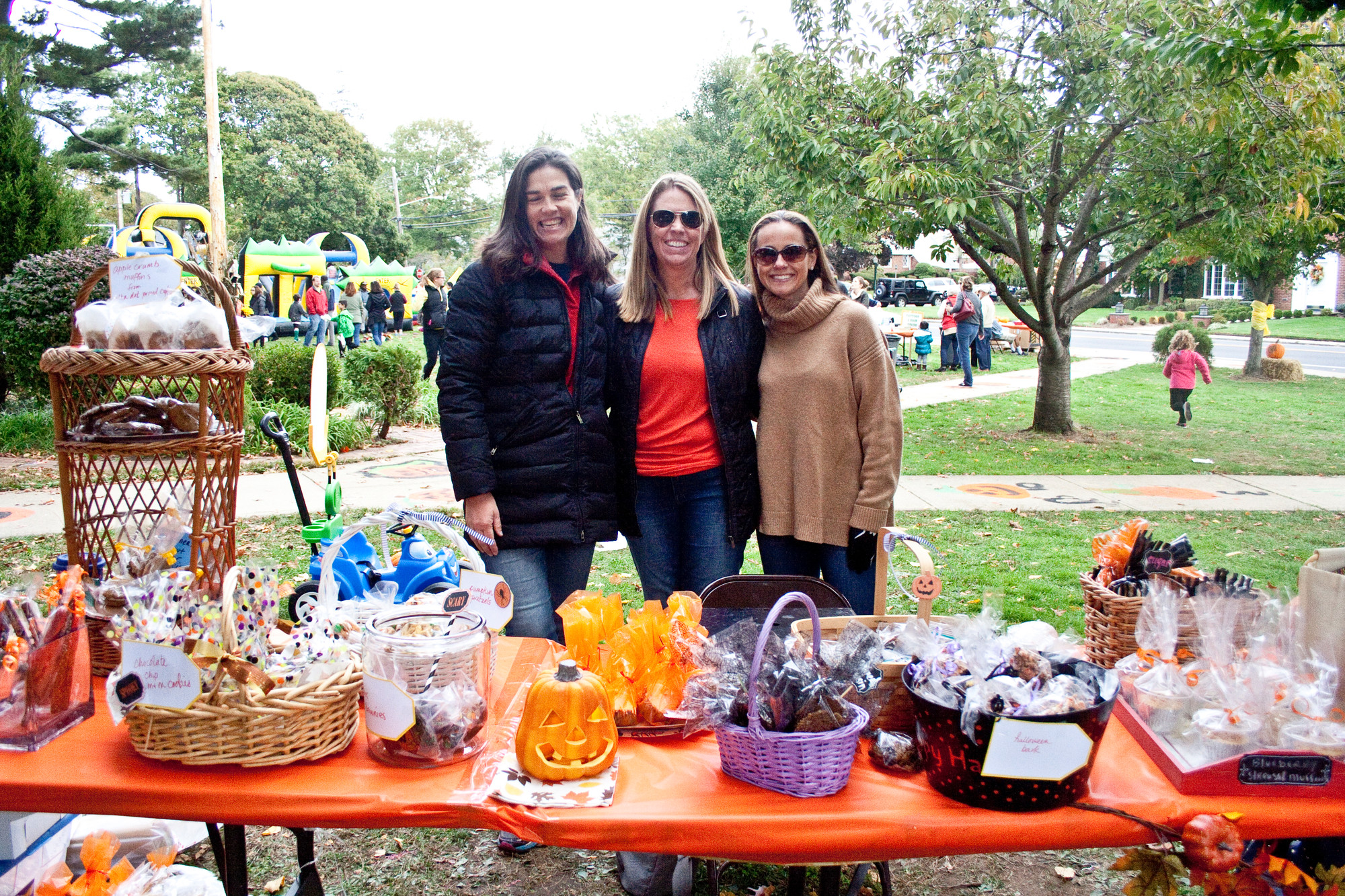 Volunteers Maureen Araneo, left, Kathy Hunter and Jessica Darcy worked at the sweets table.