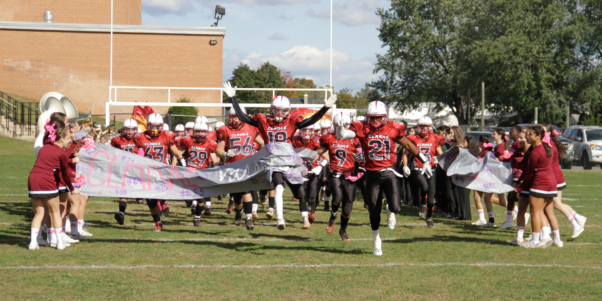 The Clarke football team, led by running back Aaron Dawson (21), took the field for Saturday’s Homecoming game against visiting Island Trees. The Rams won, 34-8.