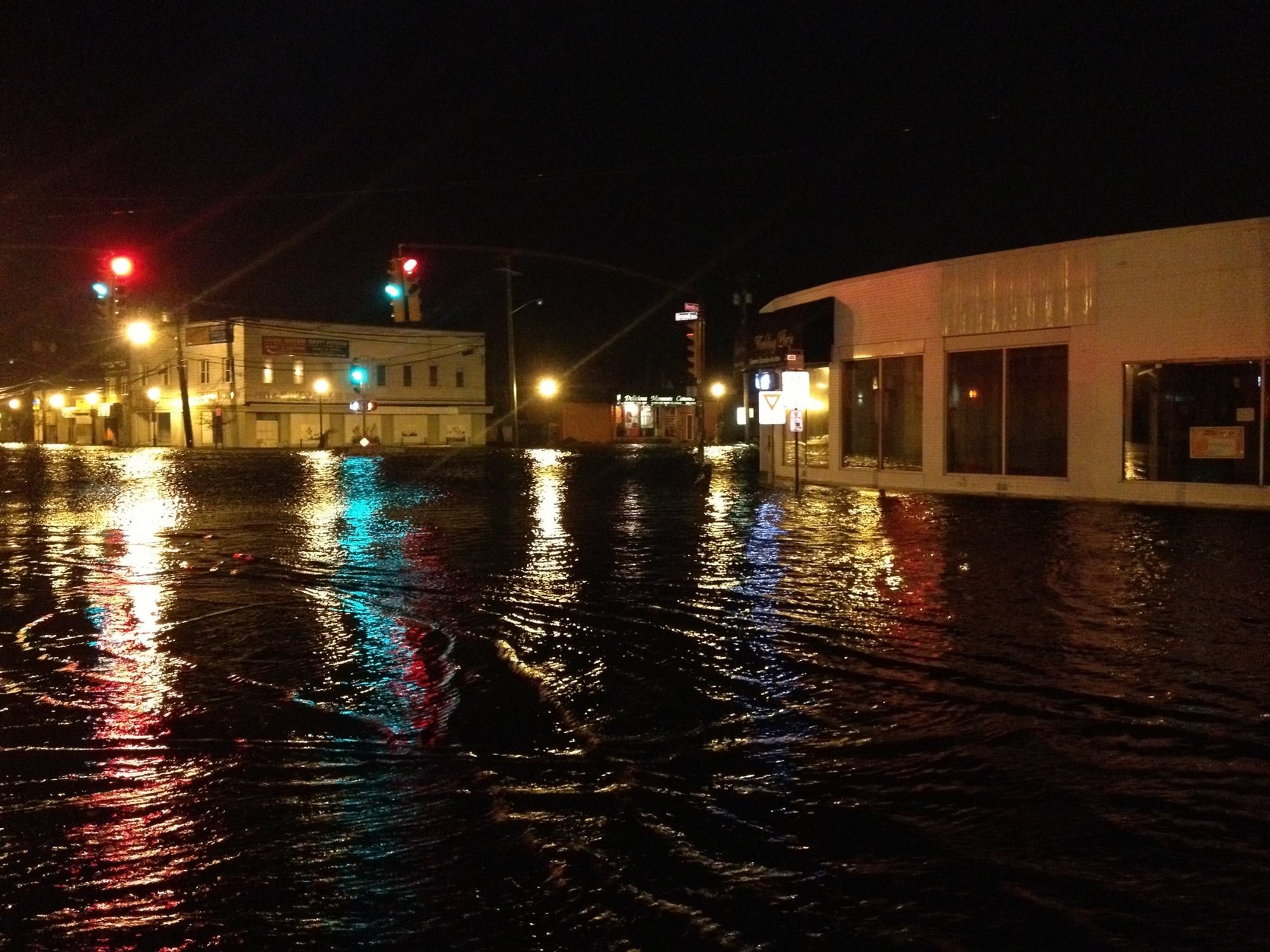 Hurricane Sandy is shown sweeping into downtown Baldwin on Oct. 29, 2012, flooding one of the community’s busiest intersections. At center, in the distance, is Steve Sciortino’s catering company, Delicious Moments, which was extensively damaged in the storm. It took Sciortino two years to recover financially.